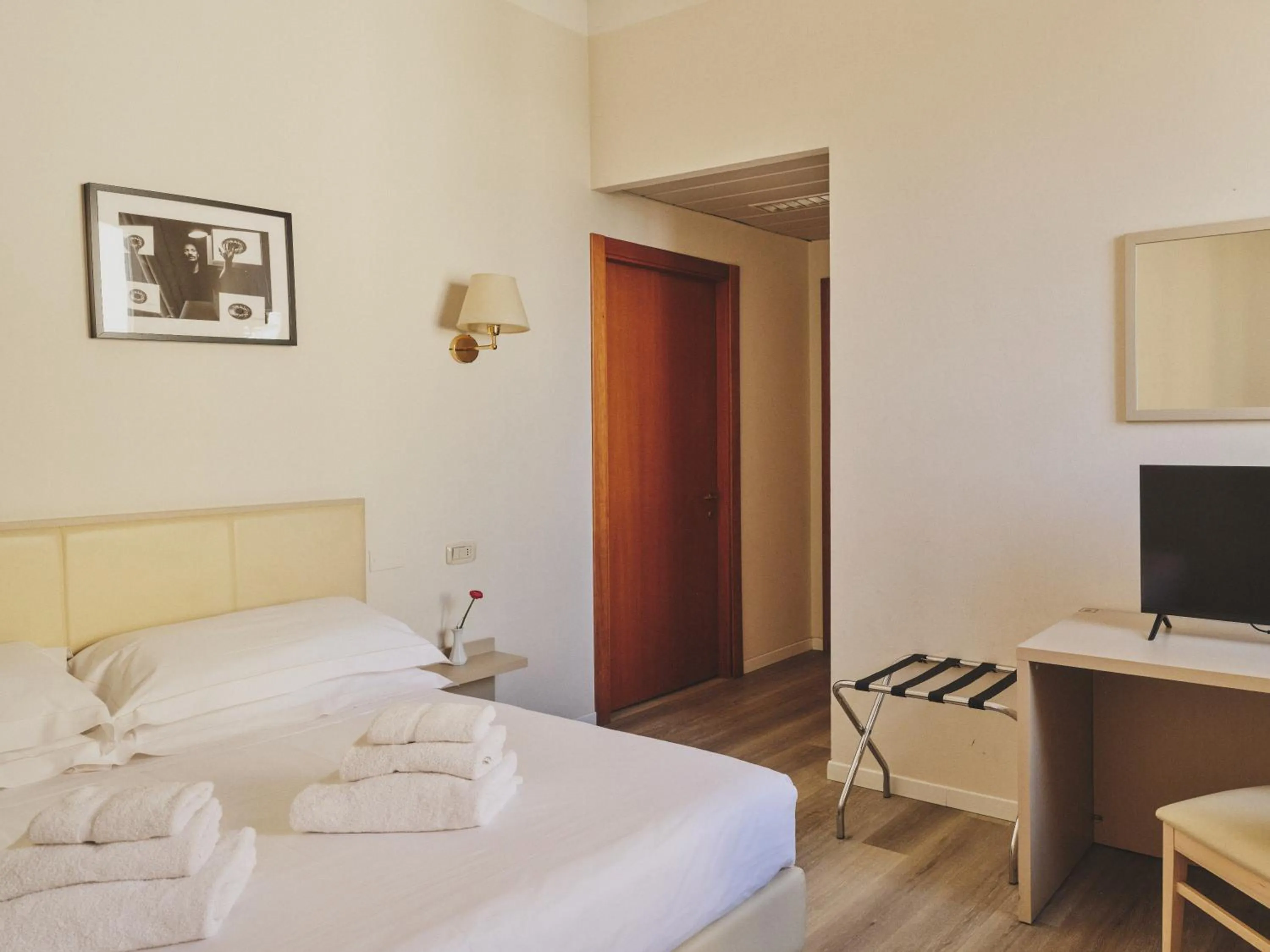 Bed in Hotel L'Aretino