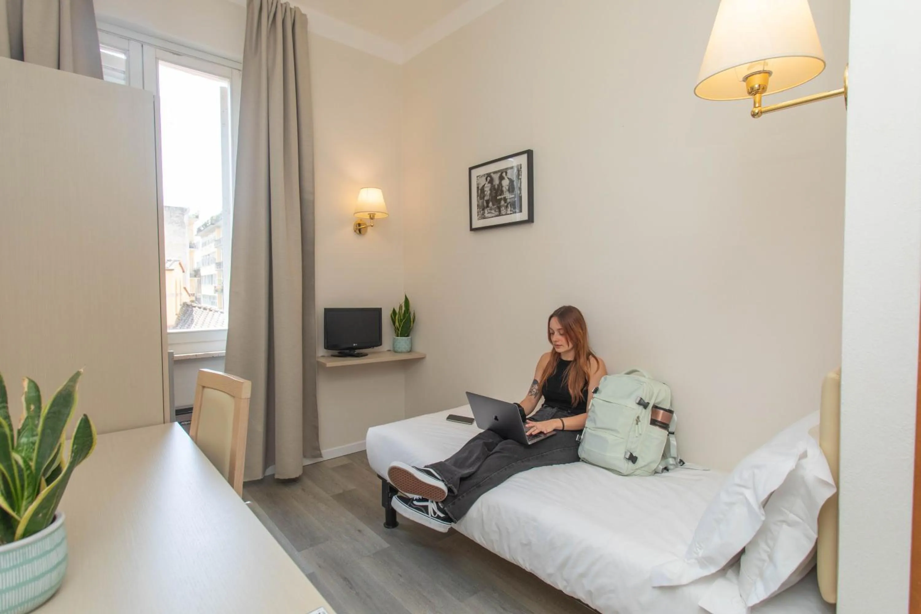 Bed in Hotel L'Aretino