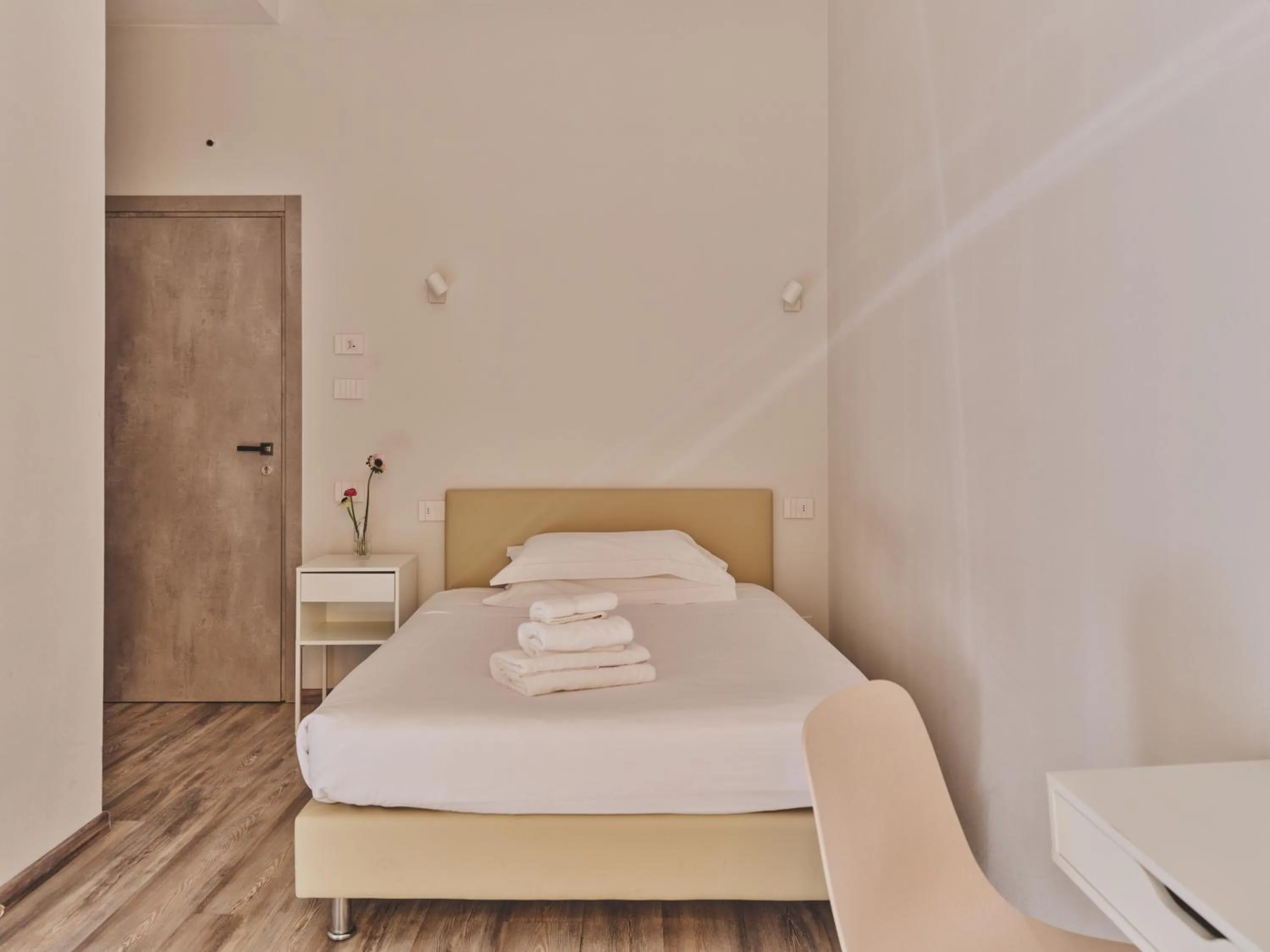 Bed in Hotel L'Aretino