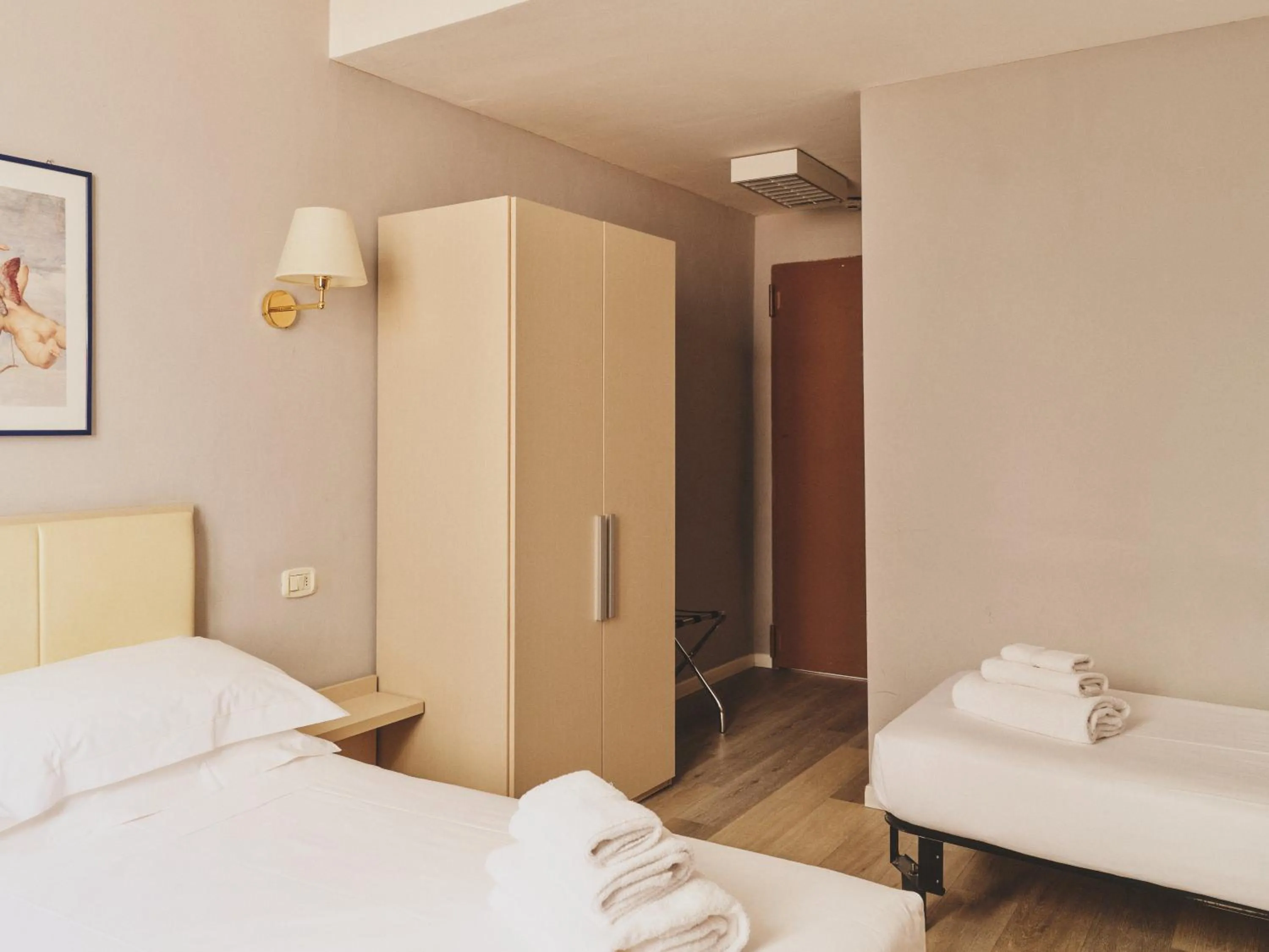 Bed in Hotel L'Aretino