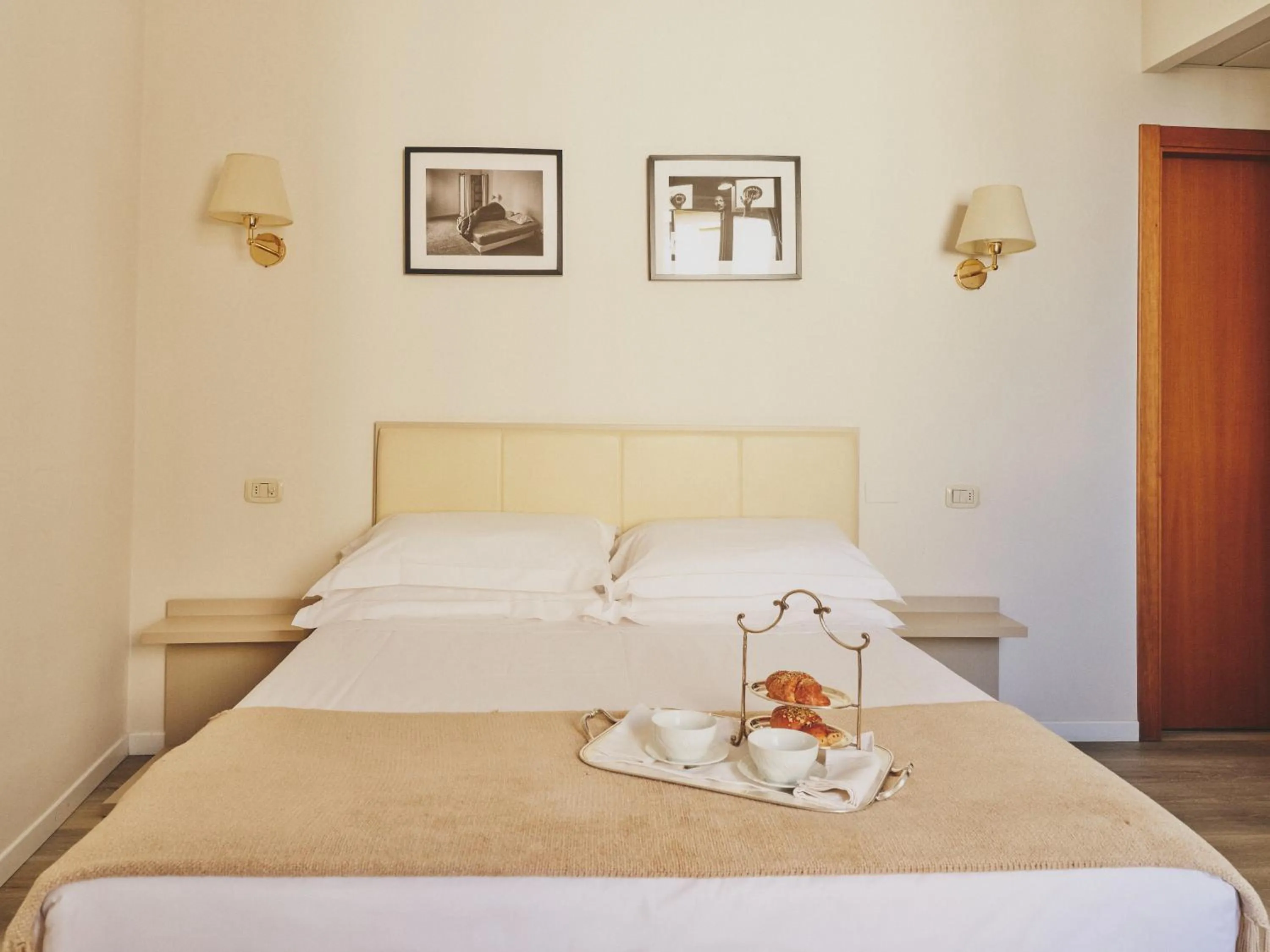 Bed in Hotel L'Aretino