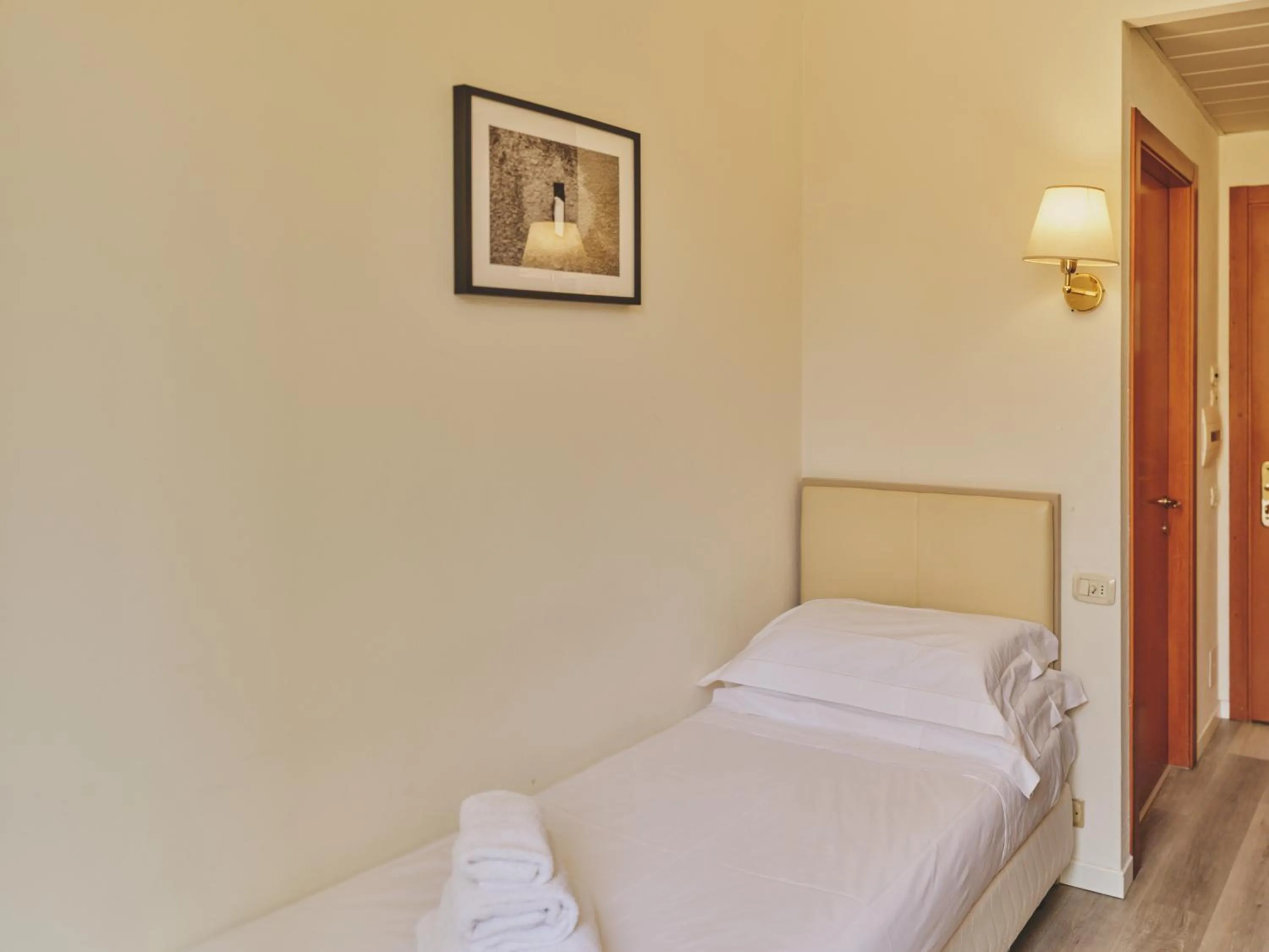 Bed in Hotel L'Aretino