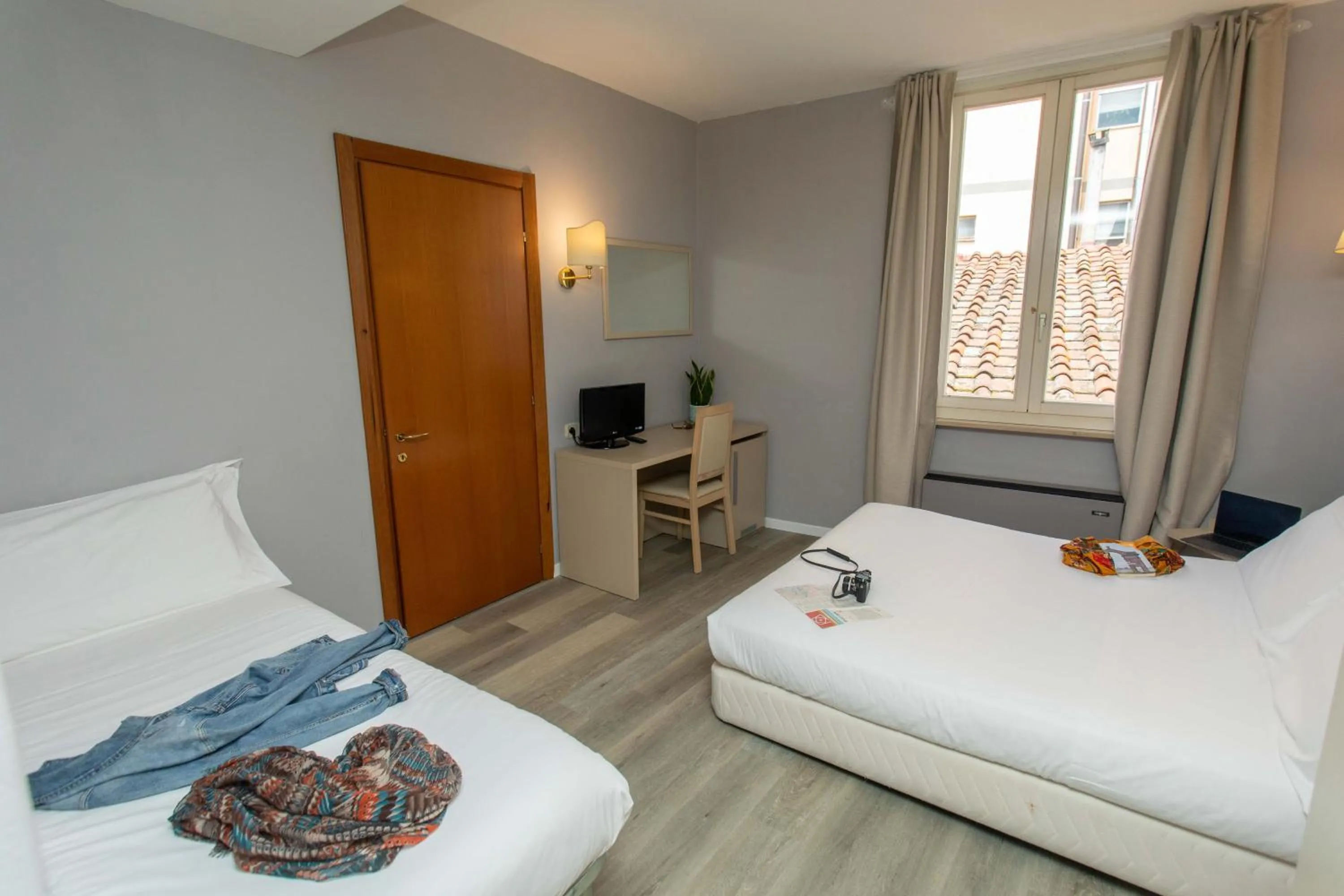 Bed in Hotel L'Aretino