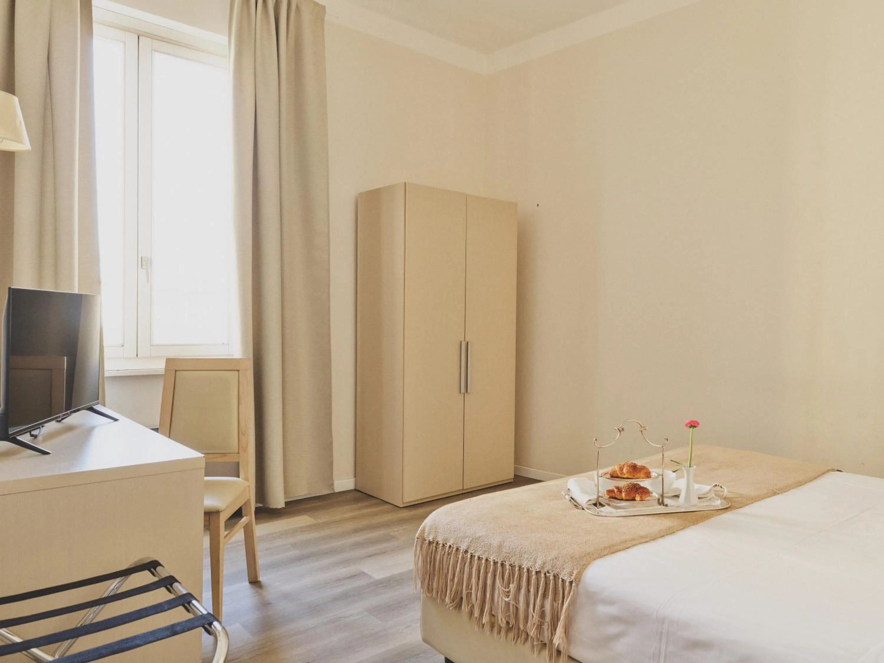 Bed in Hotel L'Aretino