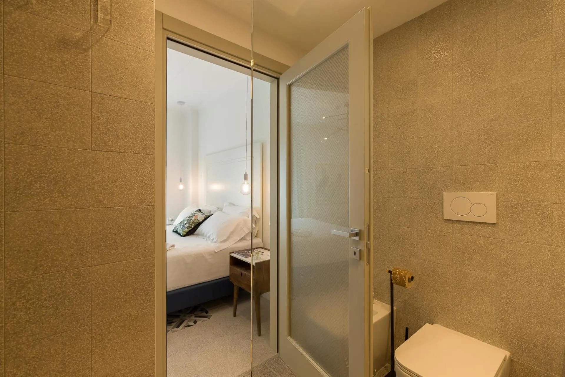 Bedroom in CasAunoE Boutique Hotel