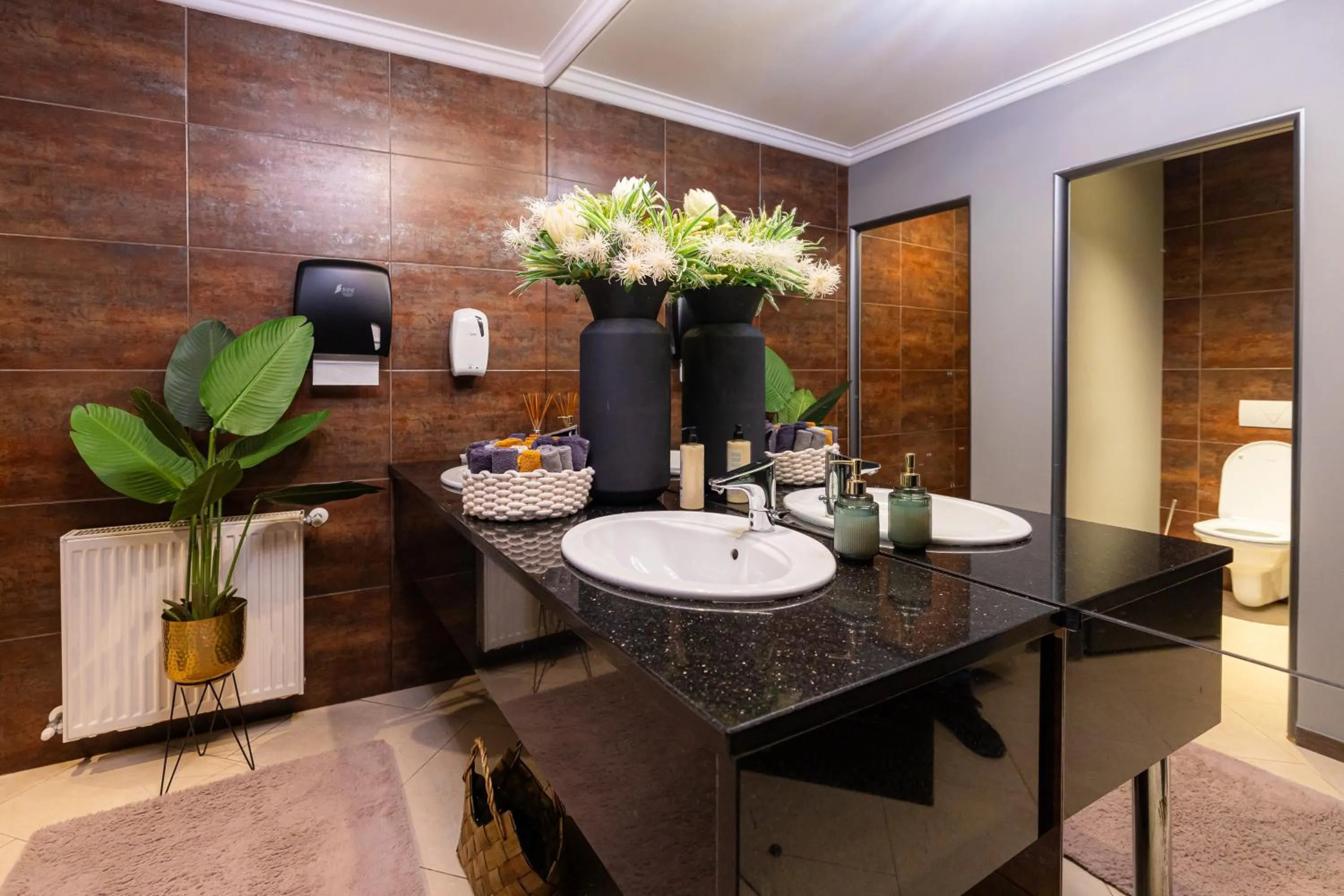 Toilet in Aria by Brilliant