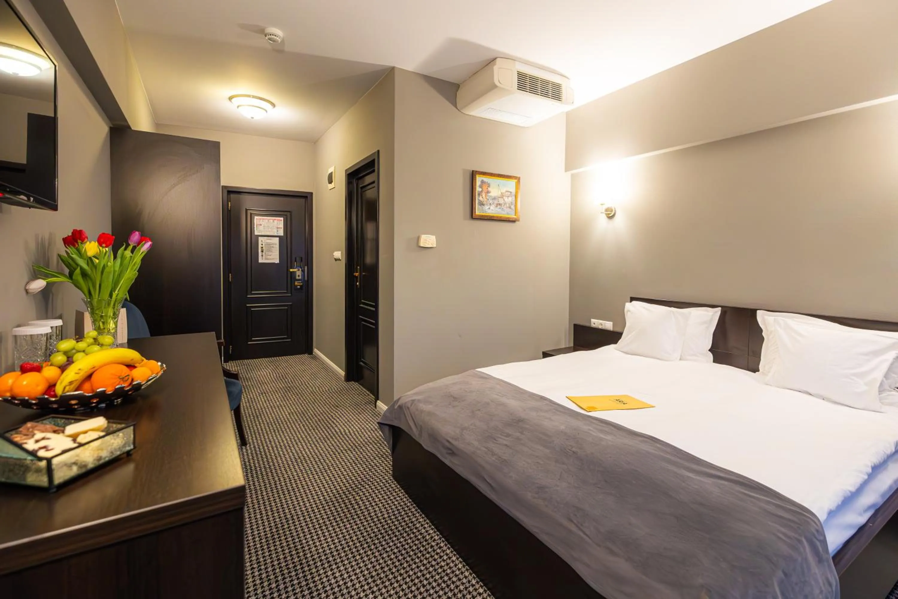 Photo of the whole room, Bed in Aria by Brilliant