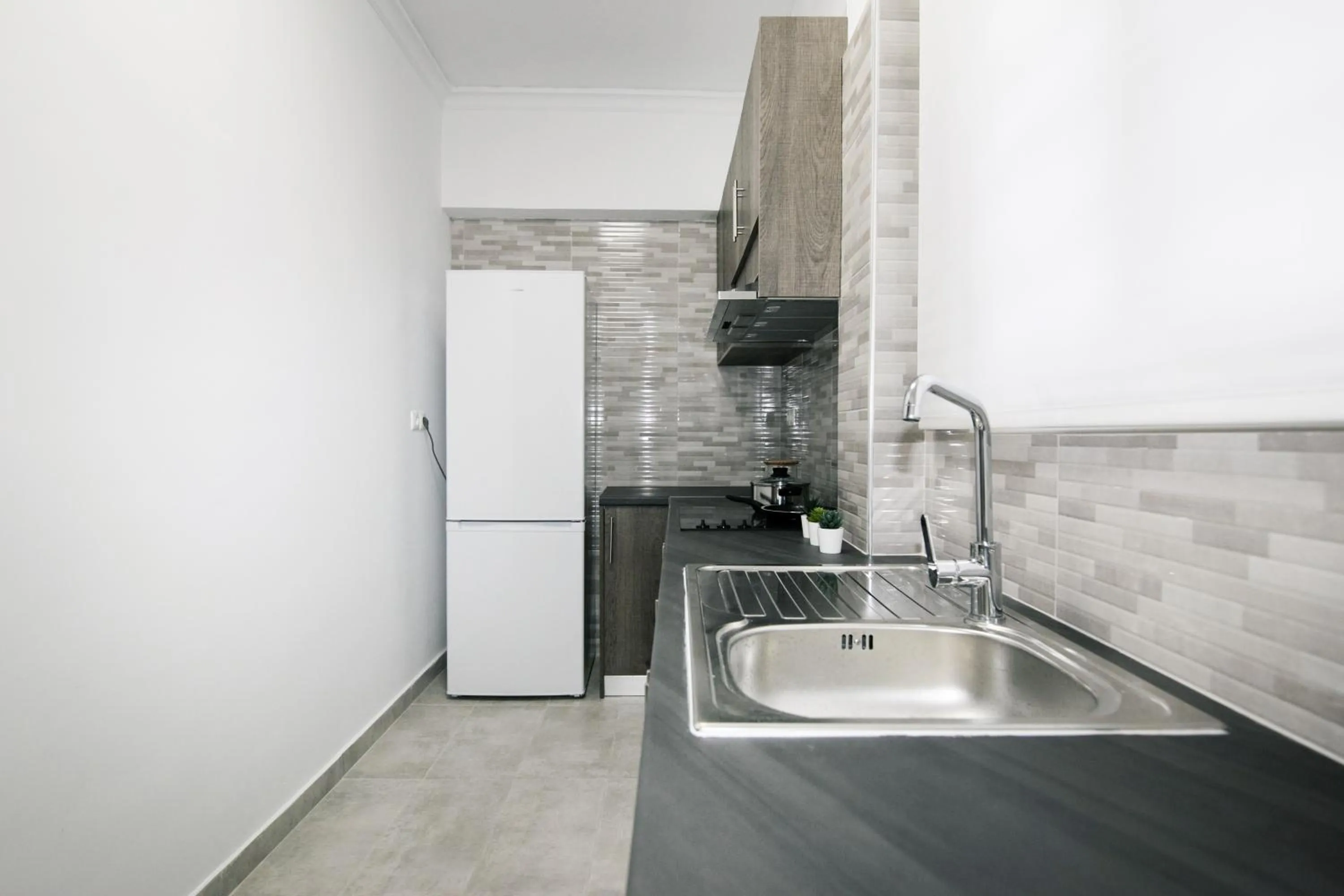 Kitchen or kitchenette in WSD Glory I Hotel Apartment
