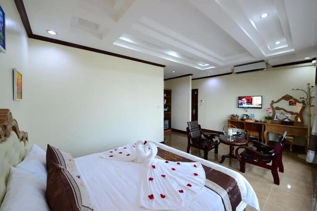 Bed in Vientiane Luxury Hotel