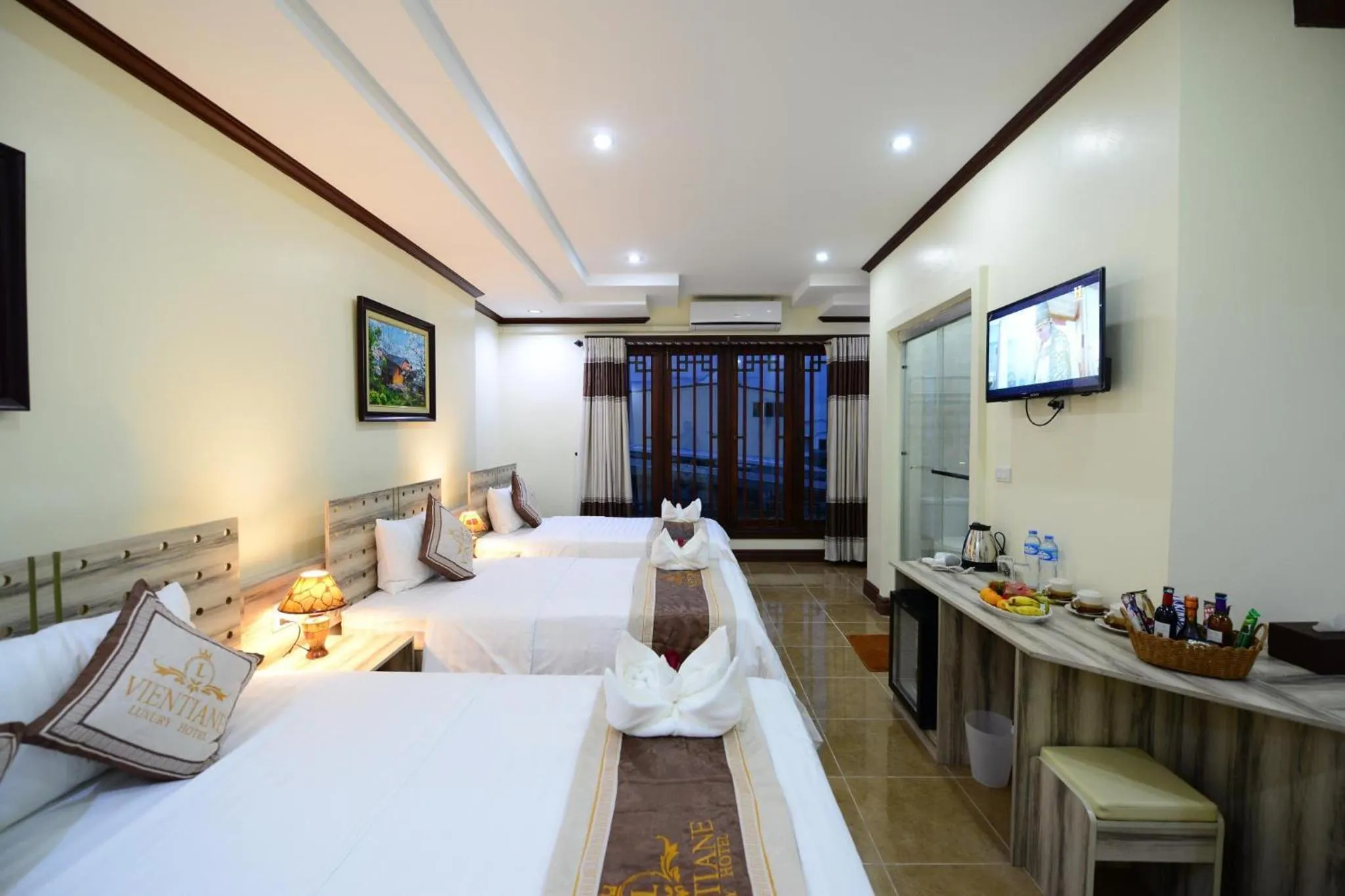 Photo of the whole room, Bed in Vientiane Luxury Hotel