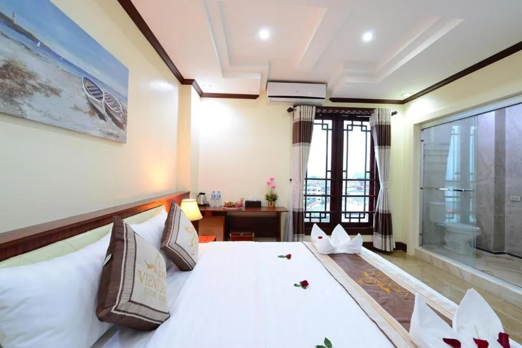 Bed in Vientiane Luxury Hotel