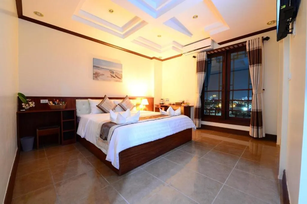 Bed in Vientiane Luxury Hotel