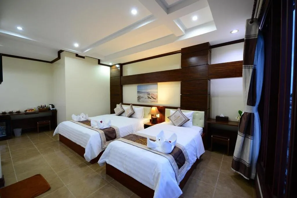 Bed in Vientiane Luxury Hotel