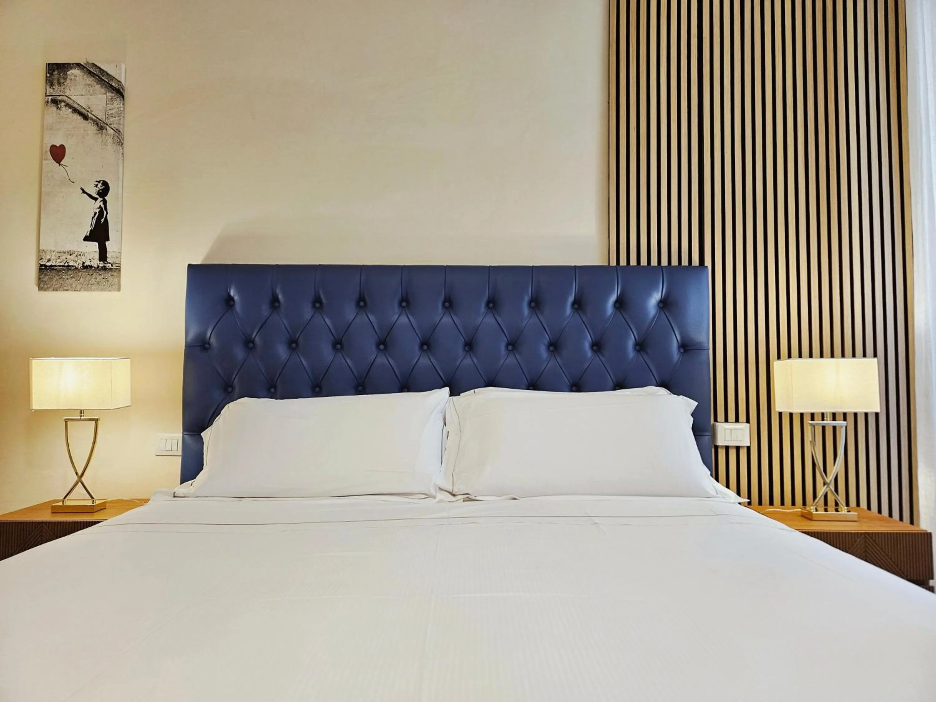 Bed in SPIRIT OF FLORENCE Boutique Rooms