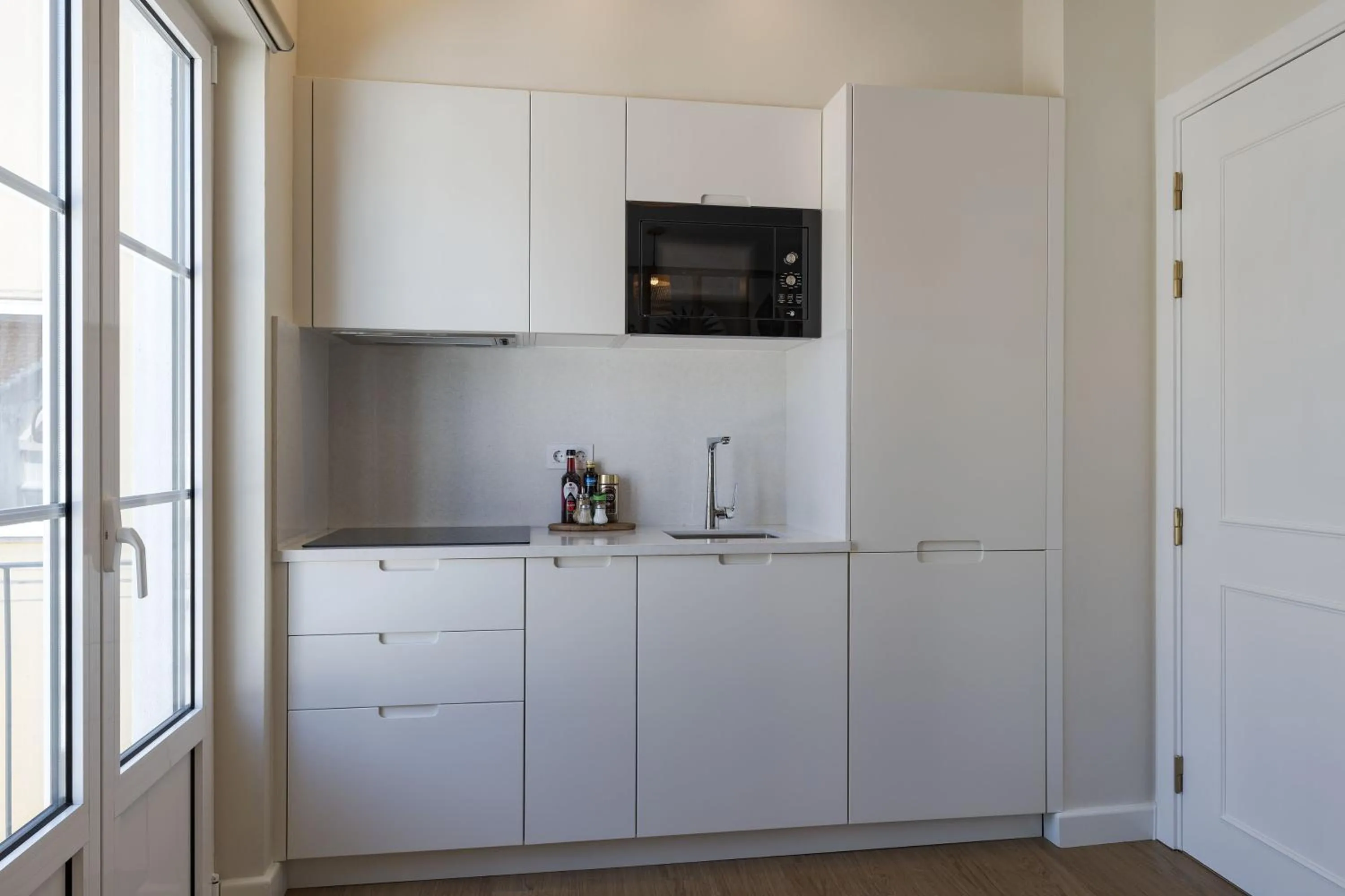 Kitchen or kitchenette in Peixeira Studios and Apartments