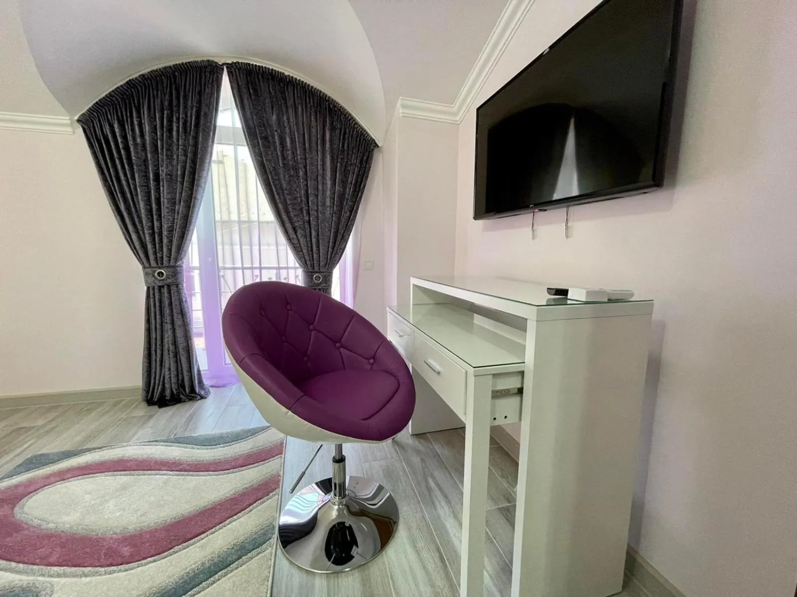 TV and multimedia in Premier City Apart Hotel Chisinau