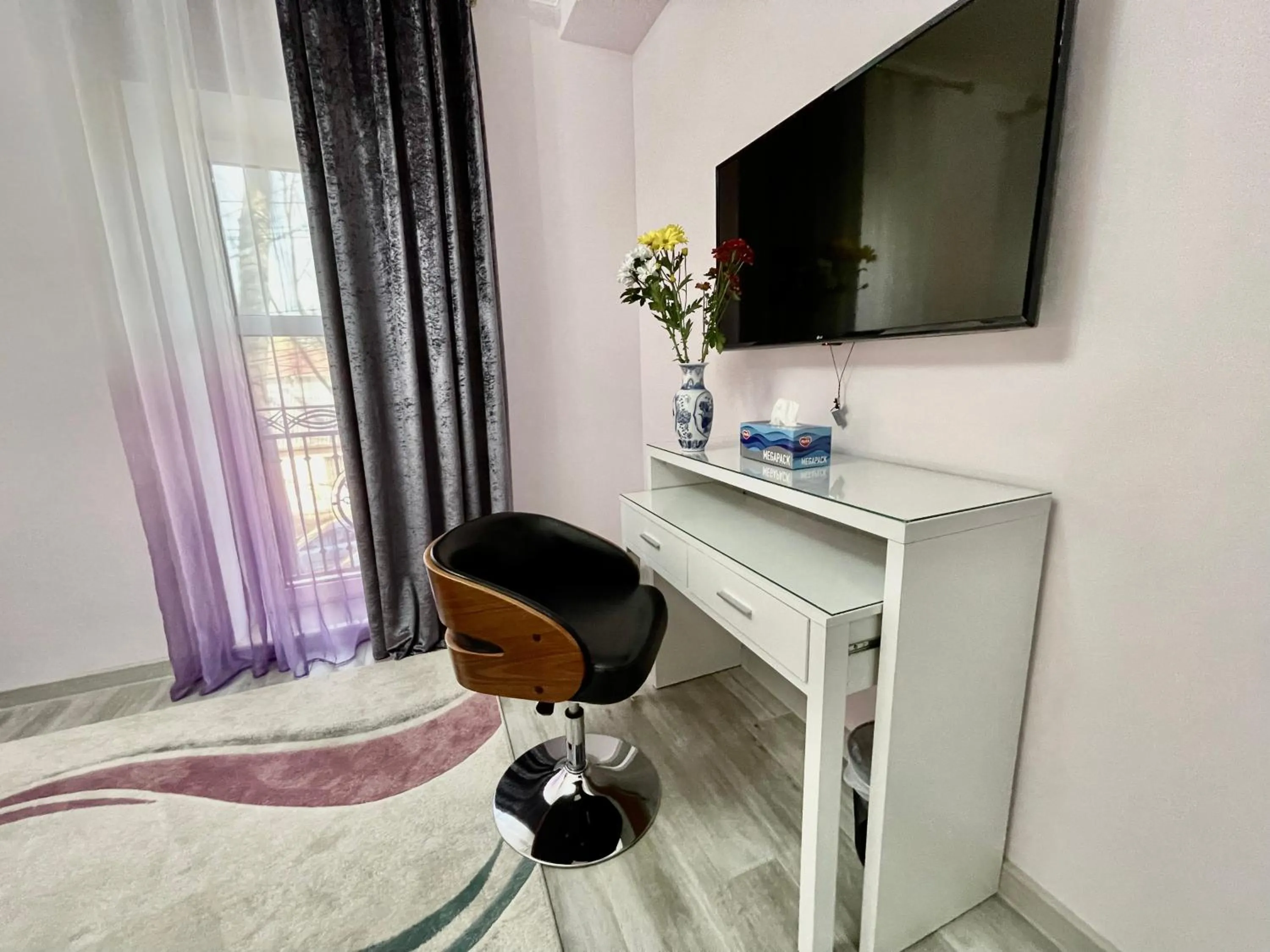 TV and multimedia in Premier City Apart Hotel Chisinau