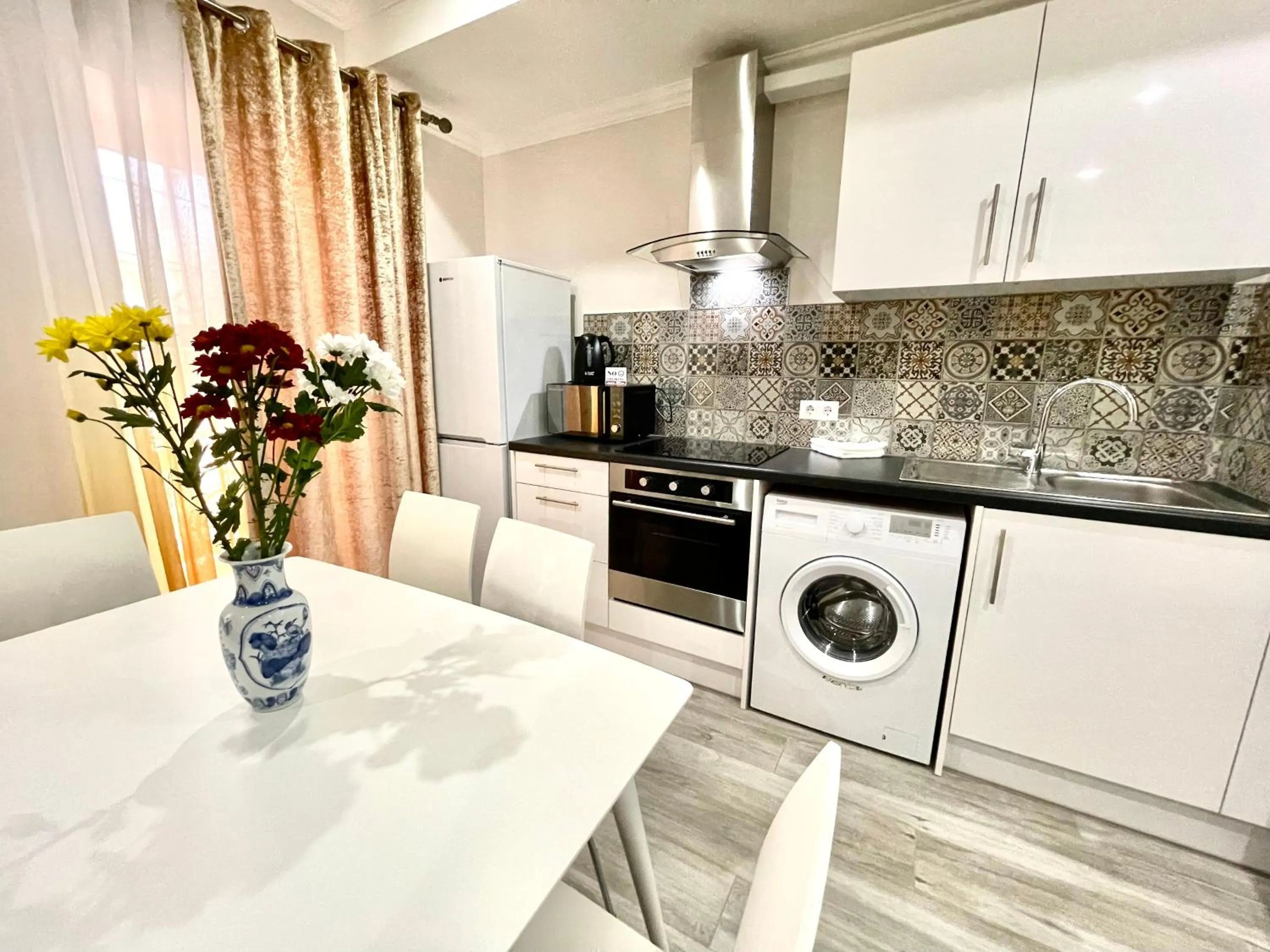 Kitchen or kitchenette in Premier City Apart Hotel Chisinau
