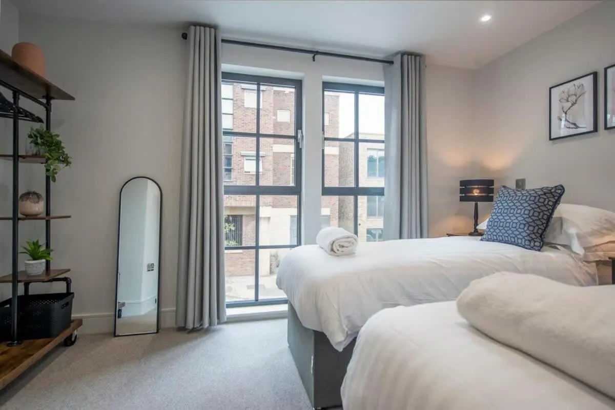 Bed in The Quadrant - The Botanical Suite