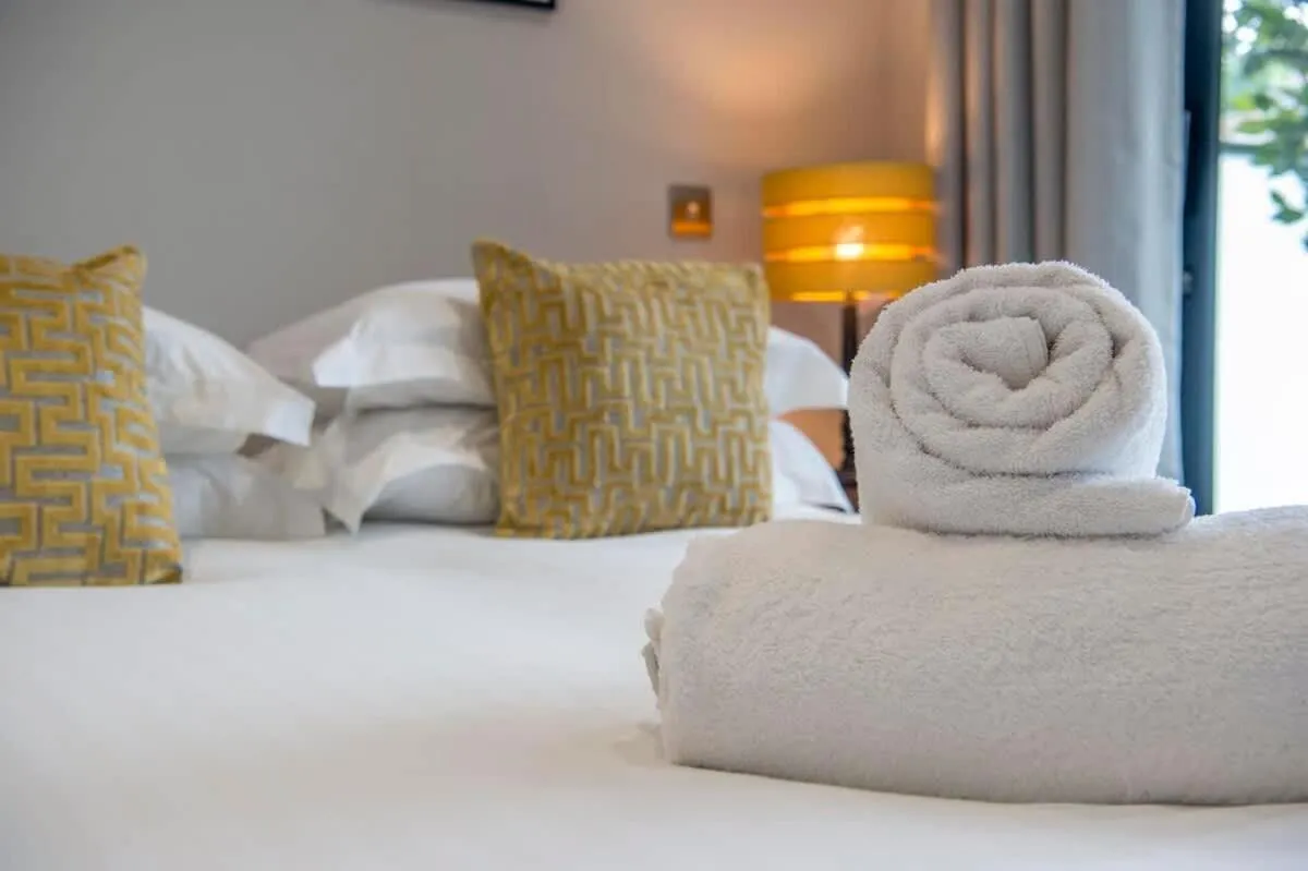 Bed in The Quadrant - The Botanical Suite