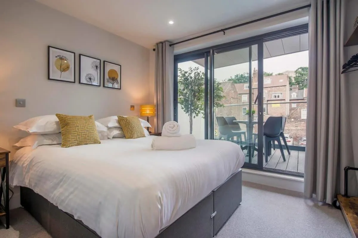 Bed in The Quadrant - The Botanical Suite