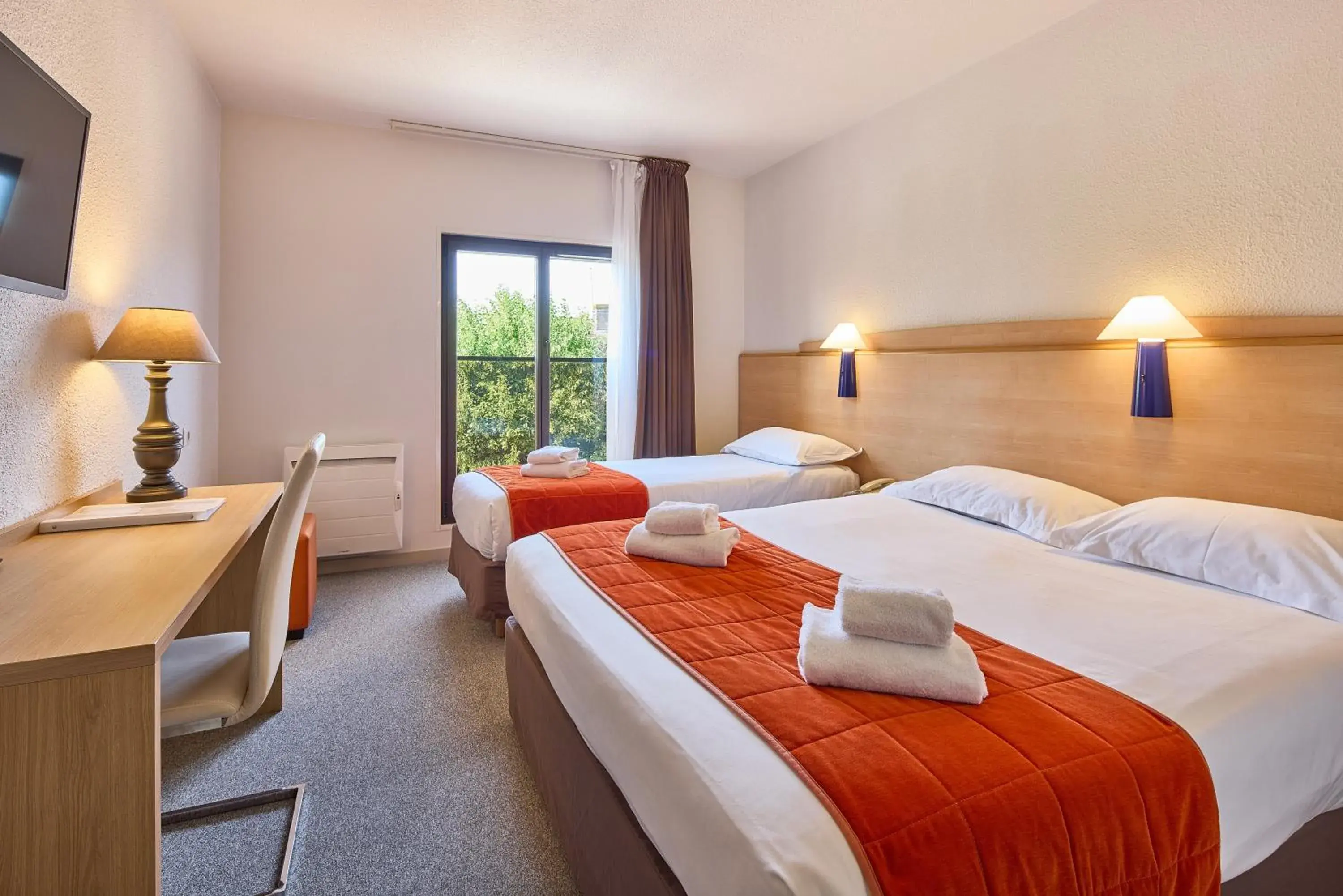 Triple Room with 1 Double Bed and 1 Single Bed in Hôtel Saint Laurent Triple Room with 1 Double Bed and 1 Single Bed in Hôtel Saint Laurent