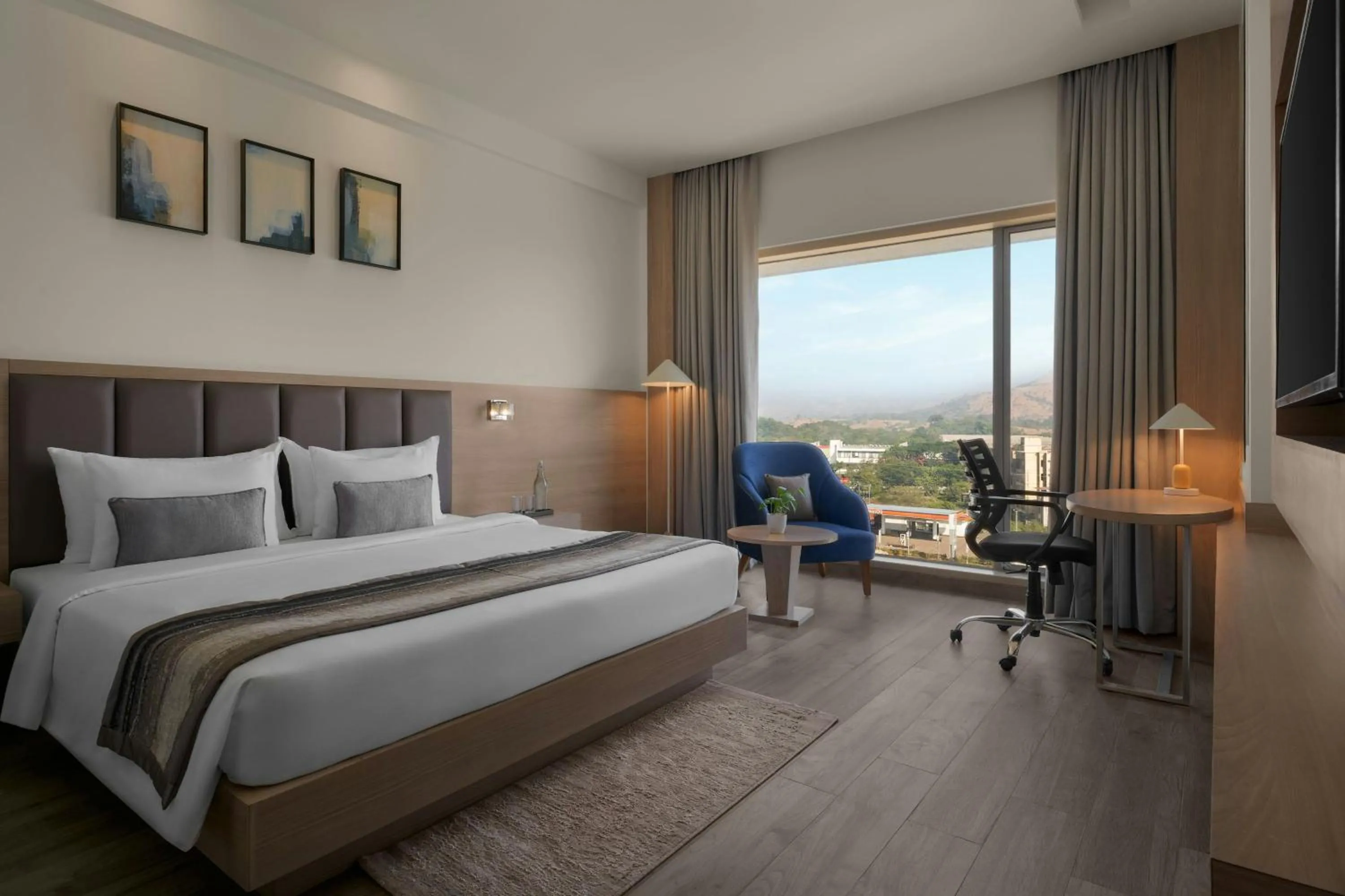 Photo of the whole room, Bed in Rakabi The Fern Igatpuri, Series By Marriott
