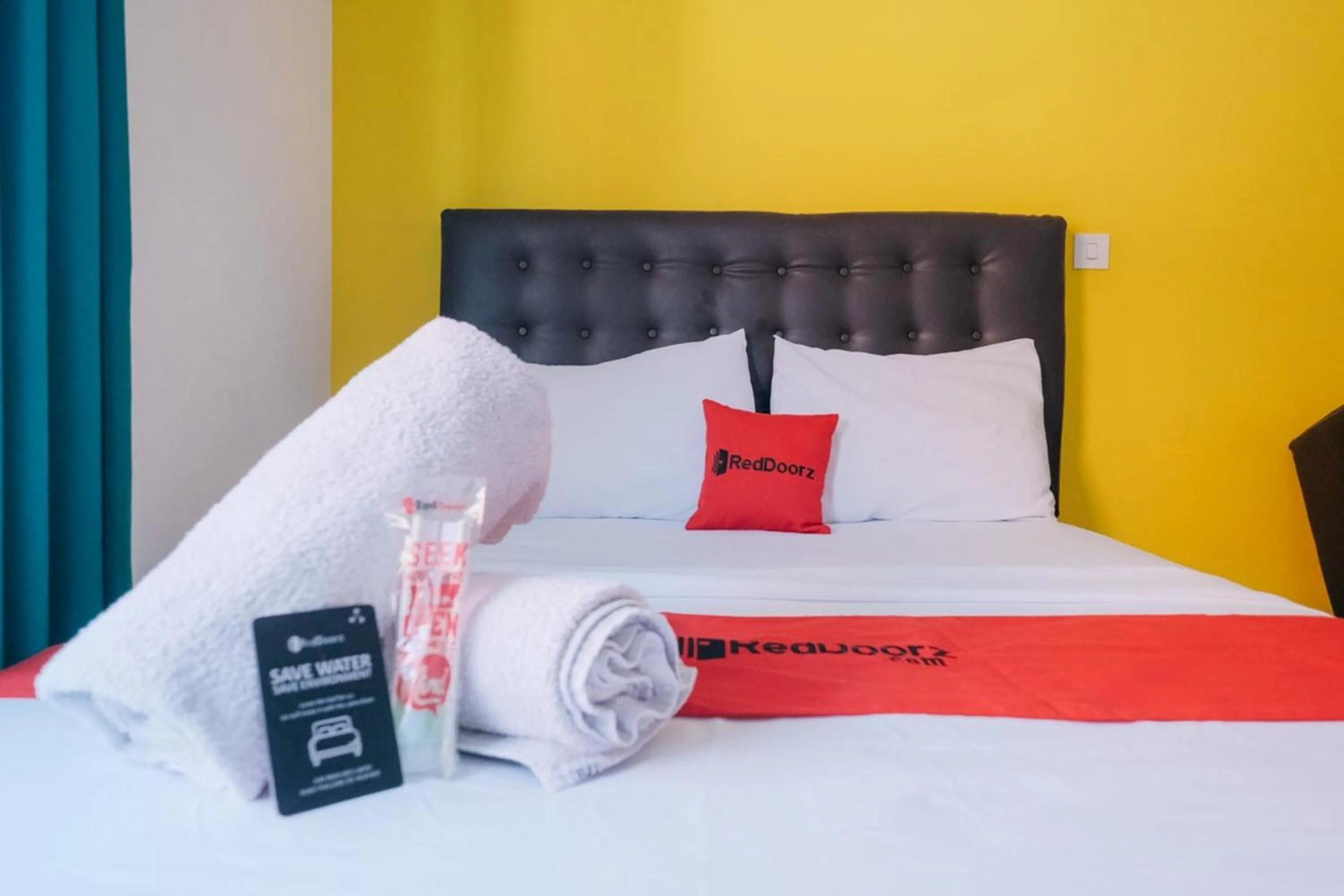 Bed in RedDoorz at Kawaii Apartment Jimbaran