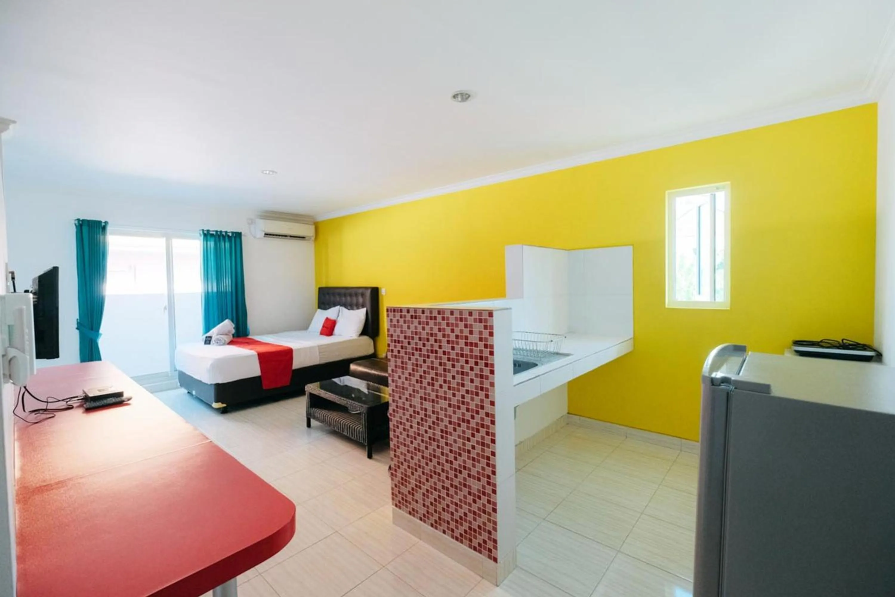 Bed in RedDoorz at Kawaii Apartment Jimbaran