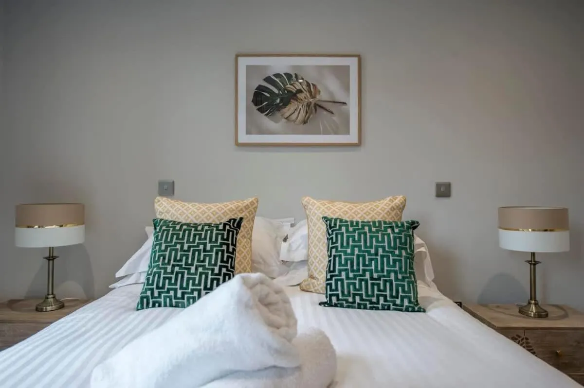 Bed in The Quadrant - The Palm Suite