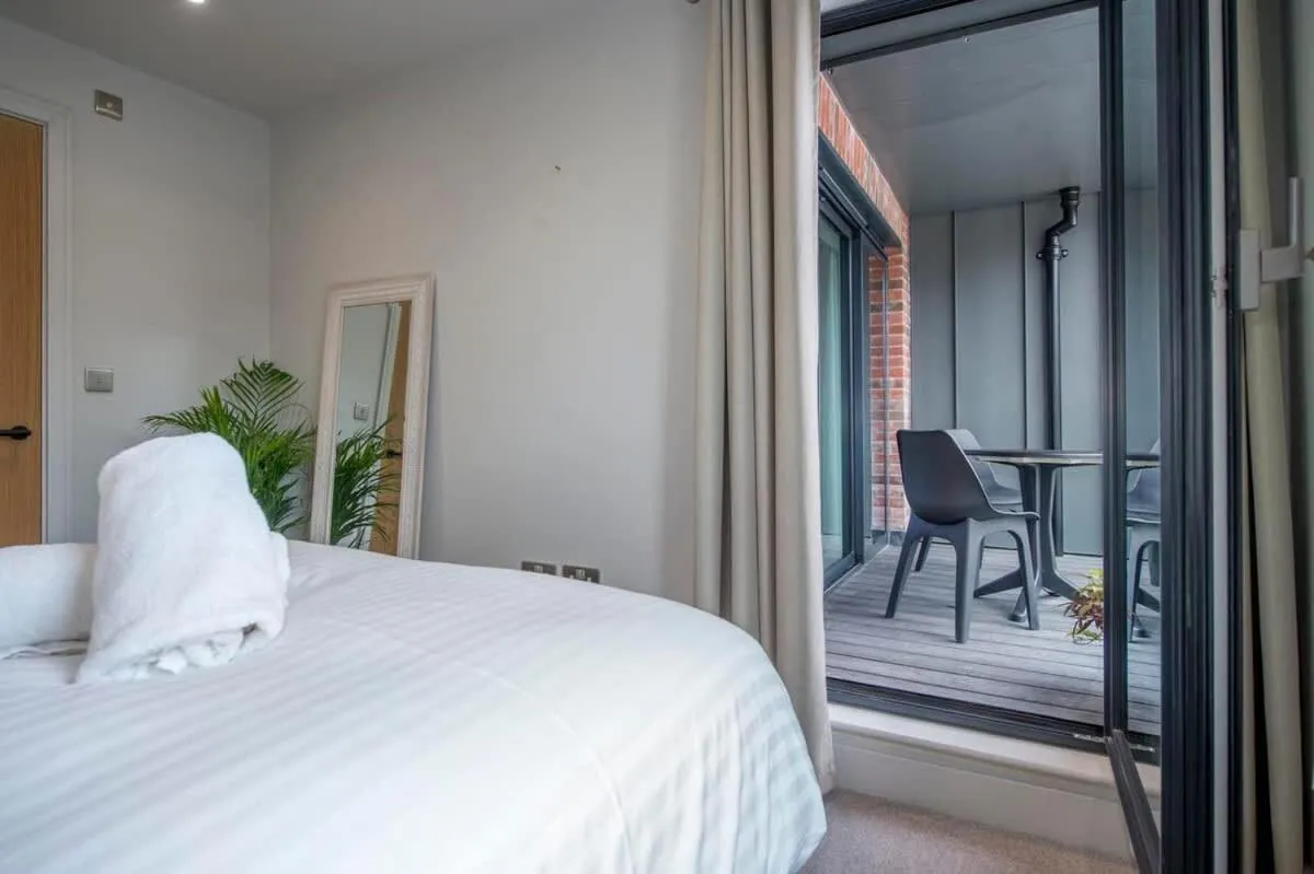 Bed in The Quadrant - The Palm Suite