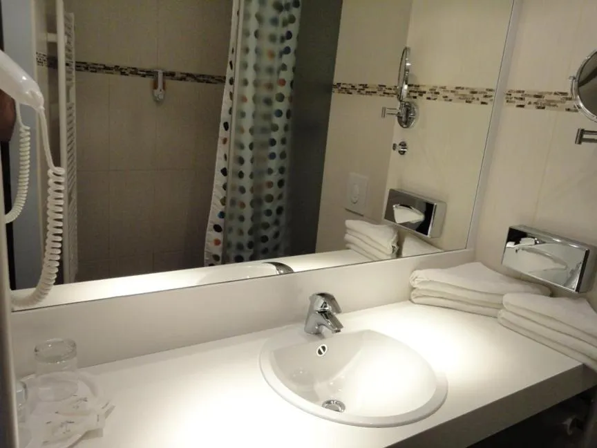 Bathroom in Grand Hotel Dream Main City Center