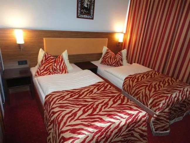 Bed in Grand Hotel Dream Main City Center