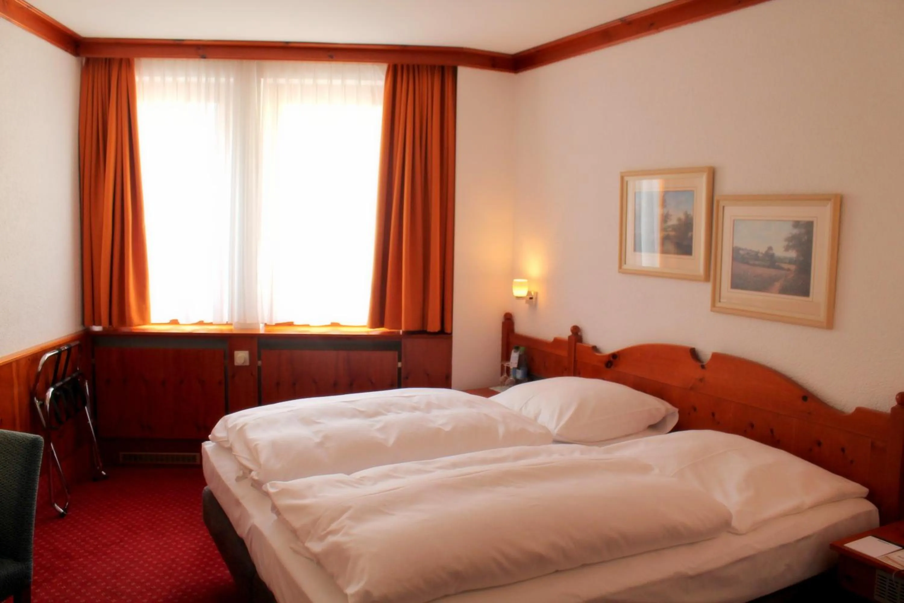 Bedroom, Bed in Steichele Hotel & Weinrestaurant