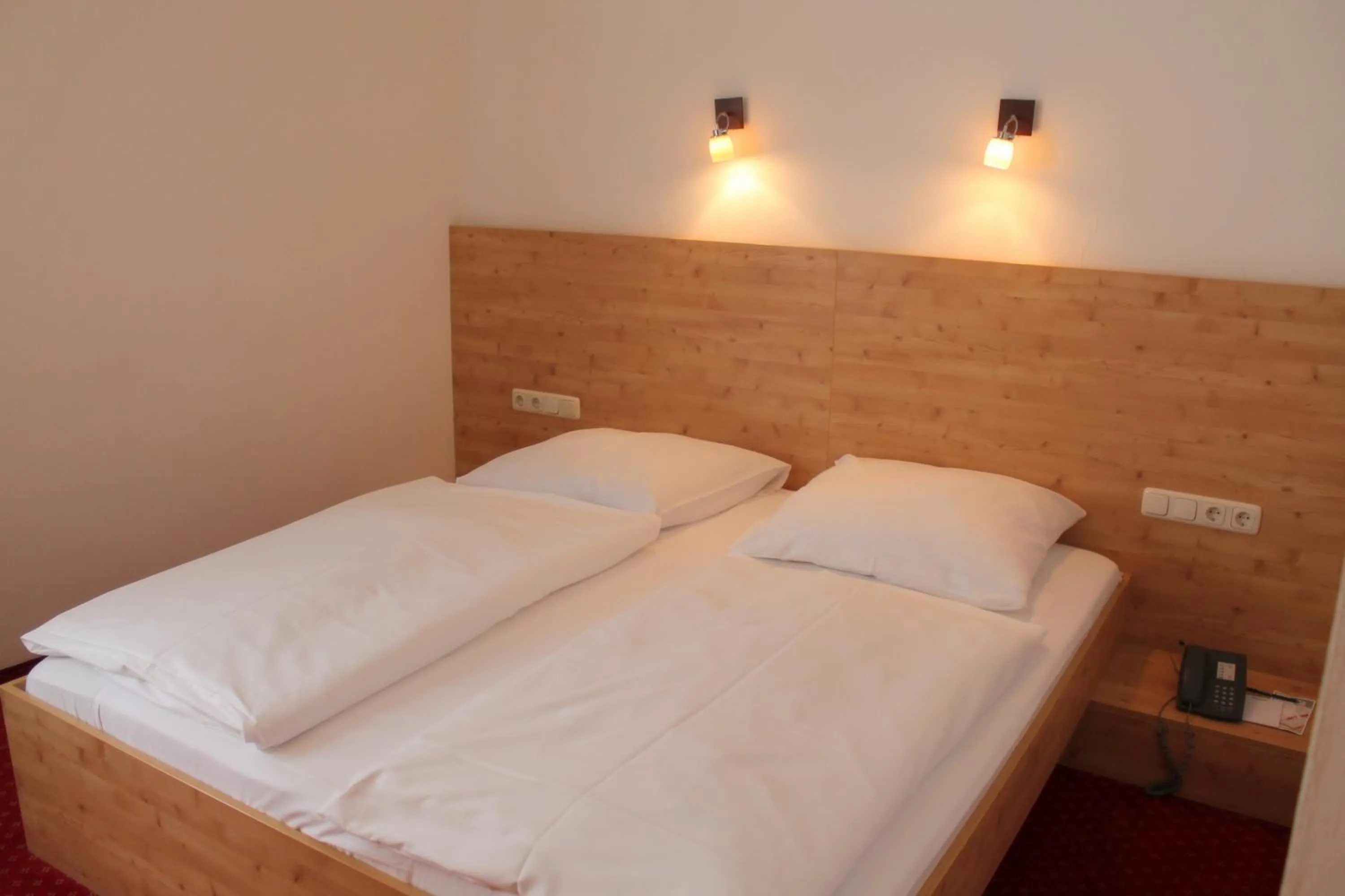 Bed in Steichele Hotel & Weinrestaurant