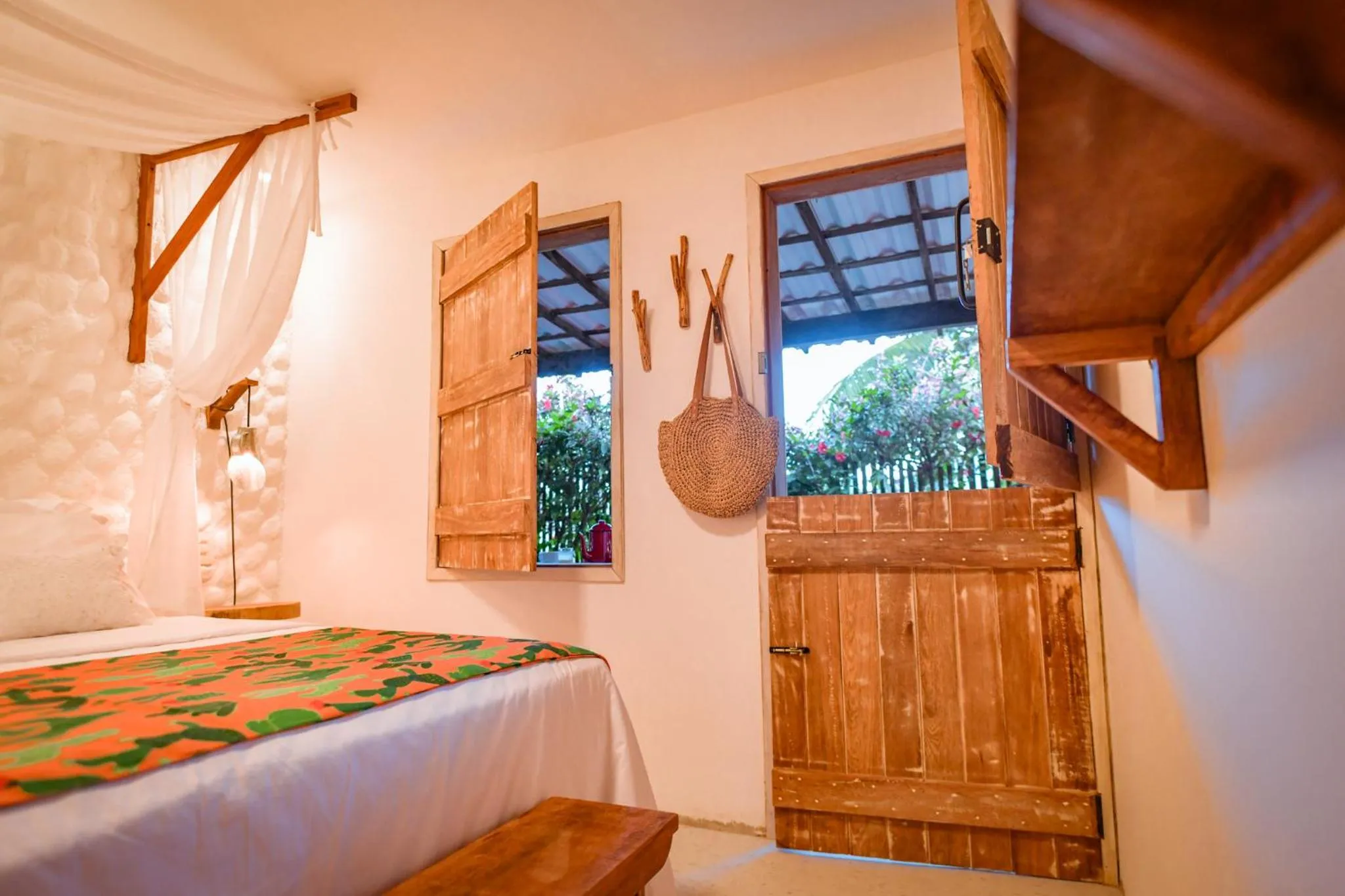 Bed in EcoCharme Pousada Netuno