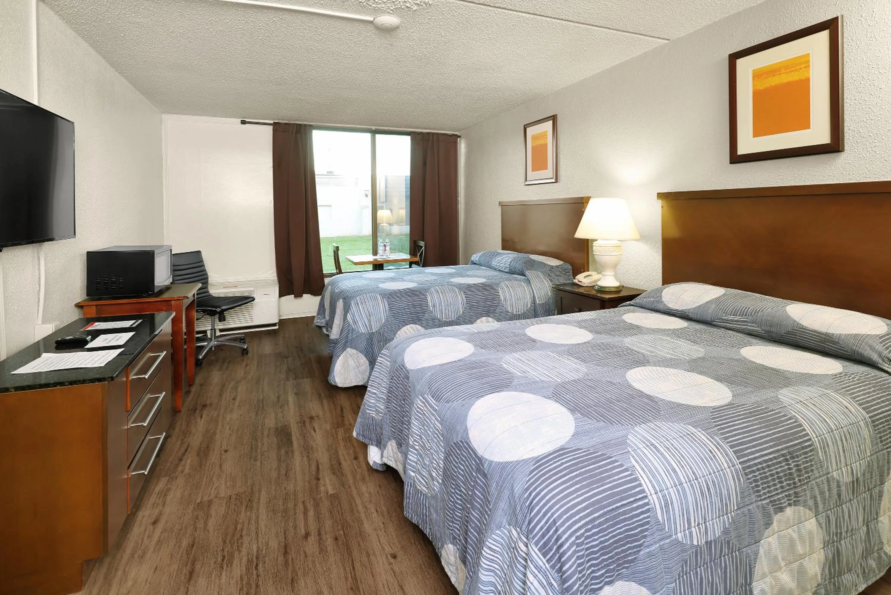 Bedroom, Bed in USA Economy Lodge