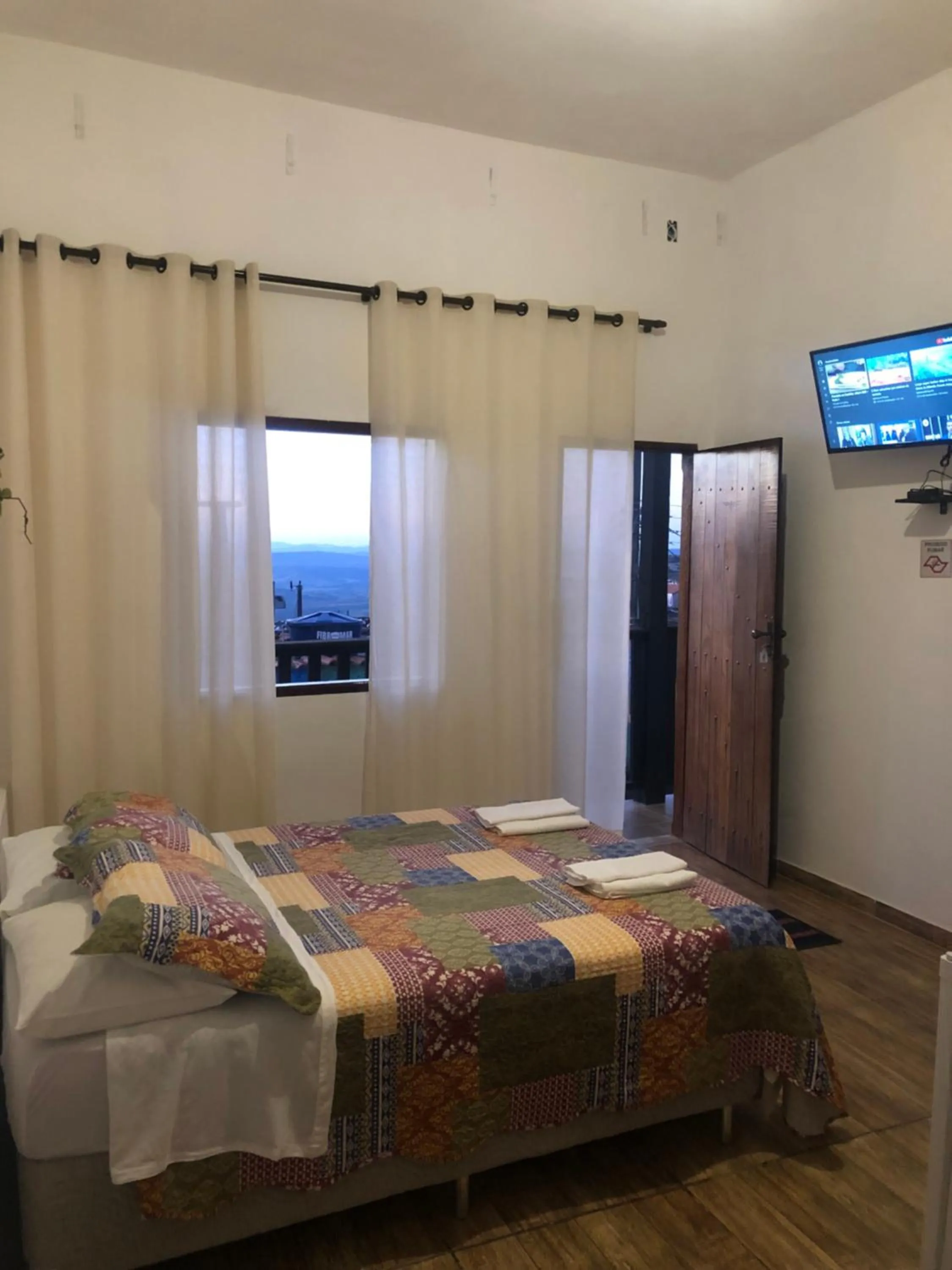 Photo of the whole room, Bed in Pousada Rosa Mistica