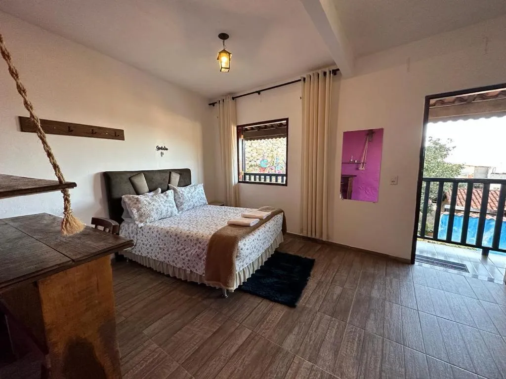 Photo of the whole room, Bed in Pousada Rosa Mistica
