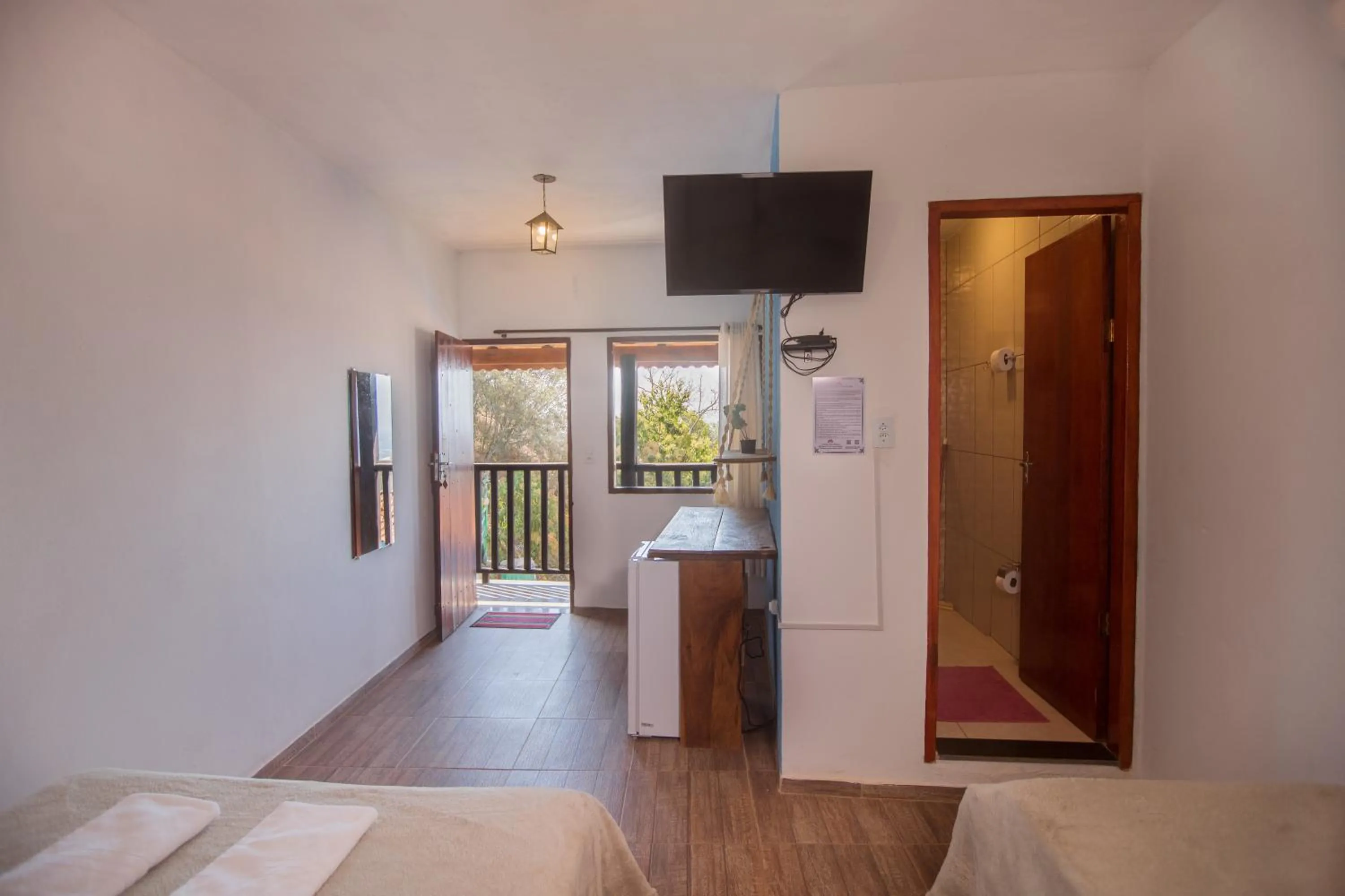 Photo of the whole room, Bed in Pousada Rosa Mistica