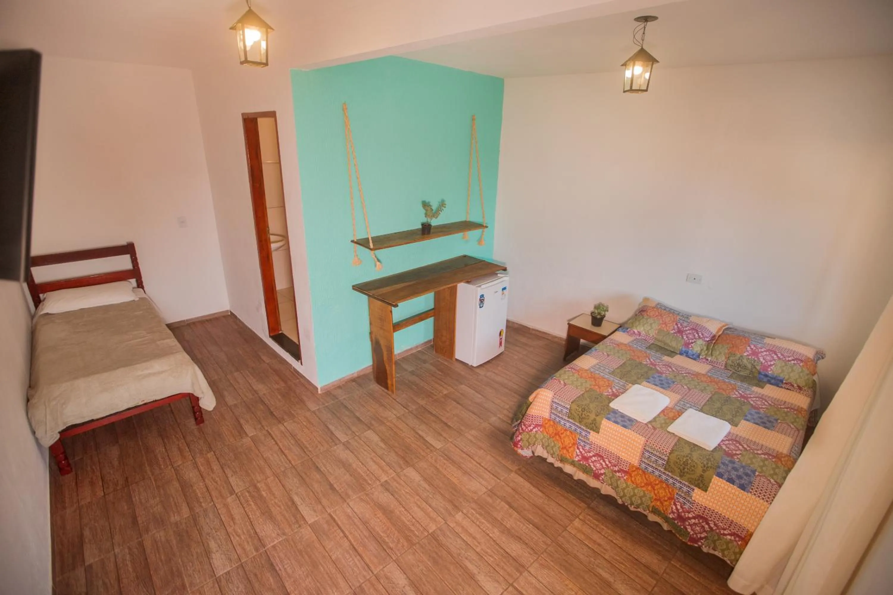 Photo of the whole room, Bed in Pousada Rosa Mistica