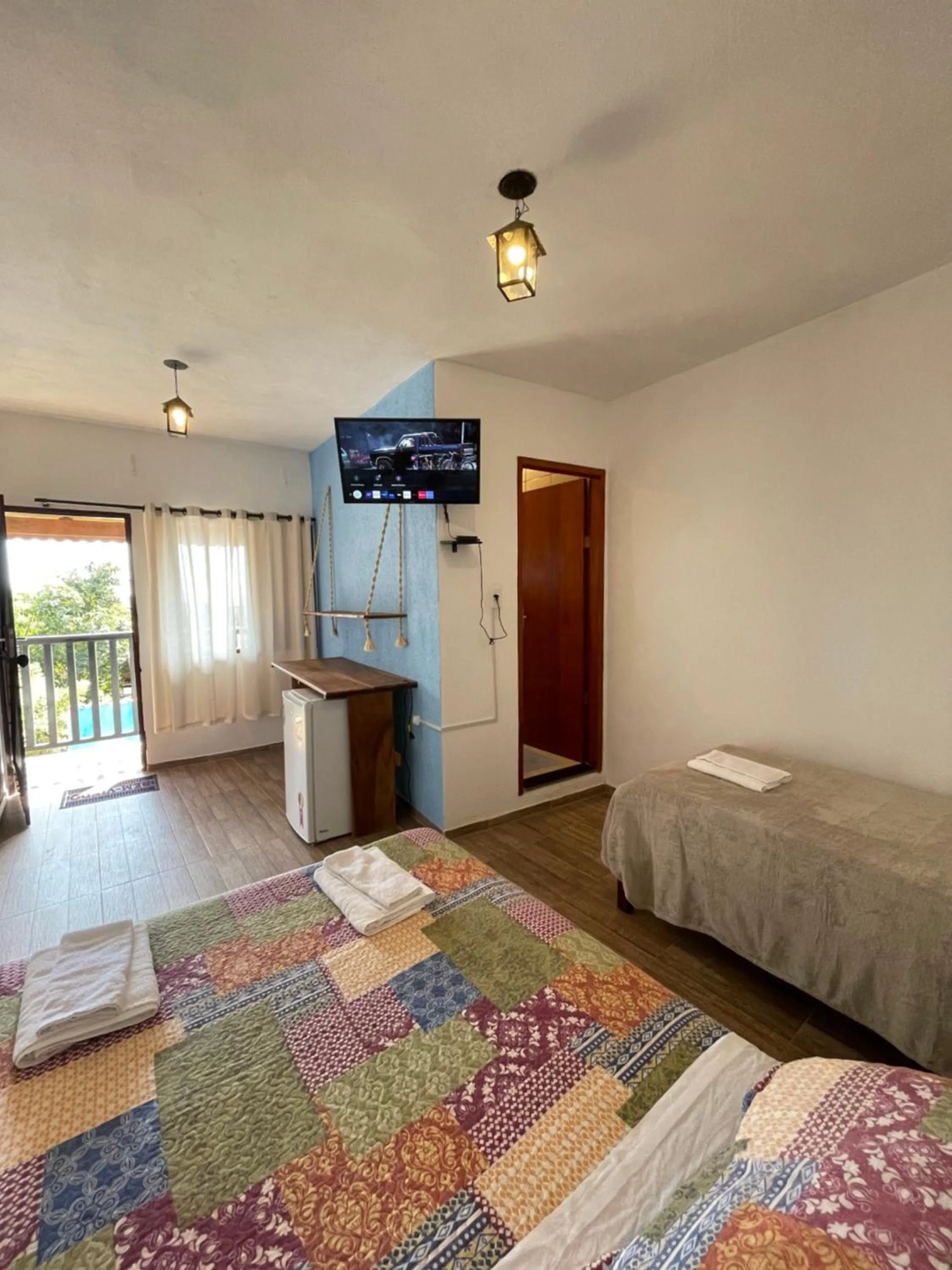 Photo of the whole room, Bed in Pousada Rosa Mistica