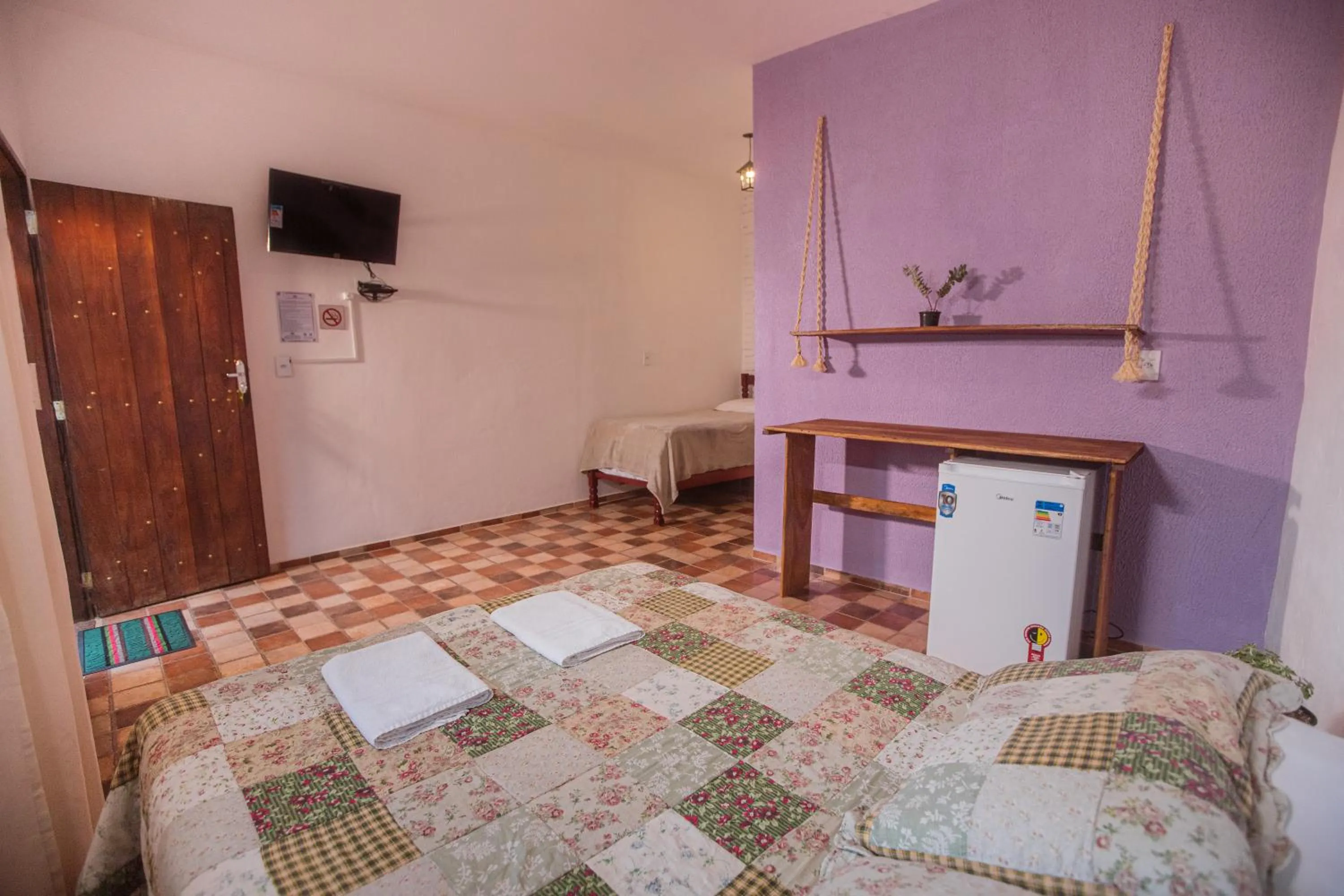Photo of the whole room, Bed in Pousada Rosa Mistica