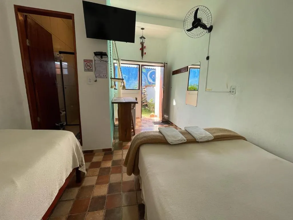 Bed in Pousada Rosa Mistica