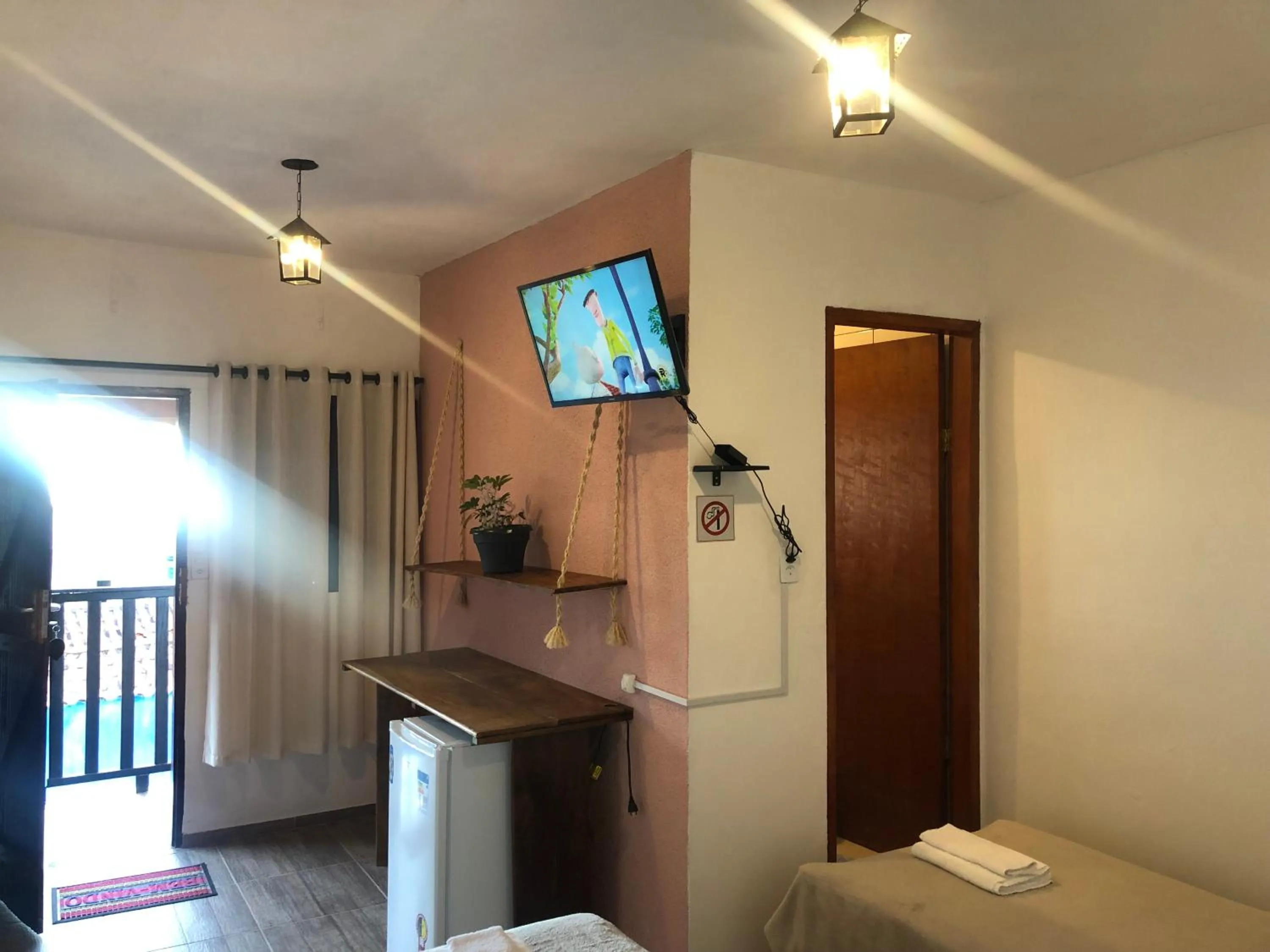 TV and multimedia, Bed in Pousada Rosa Mistica