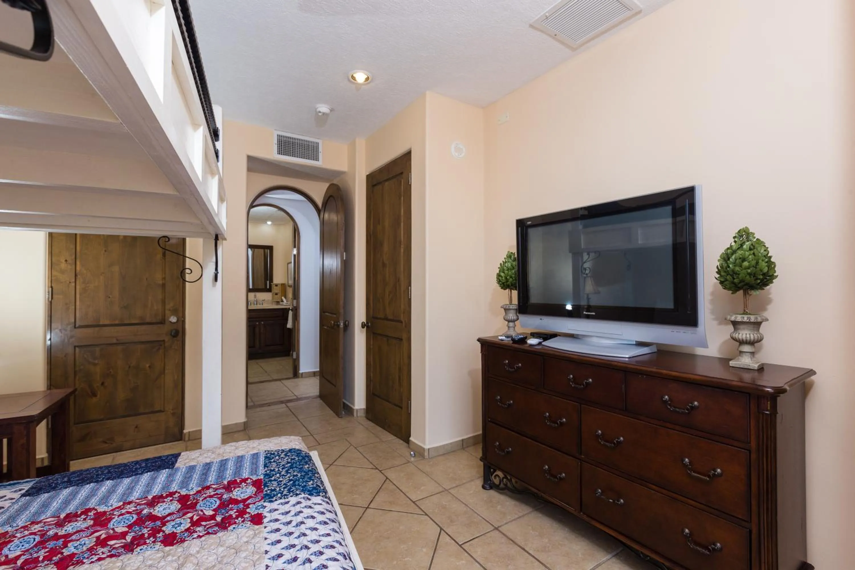 Bed in Bella Sirena Luxury Resort 205-D