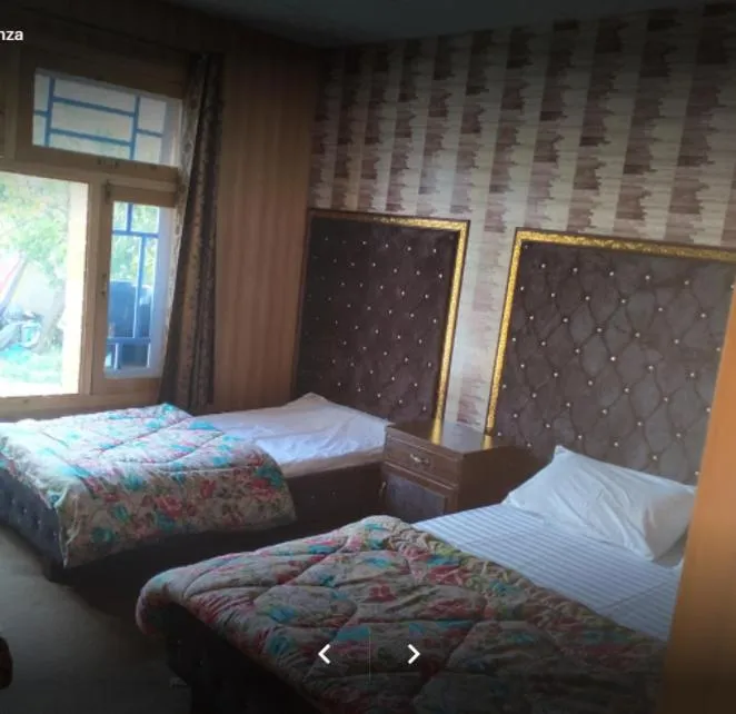 Bed in Arcadian Inn Hotel