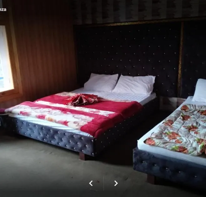 Bed in Arcadian Inn Hotel