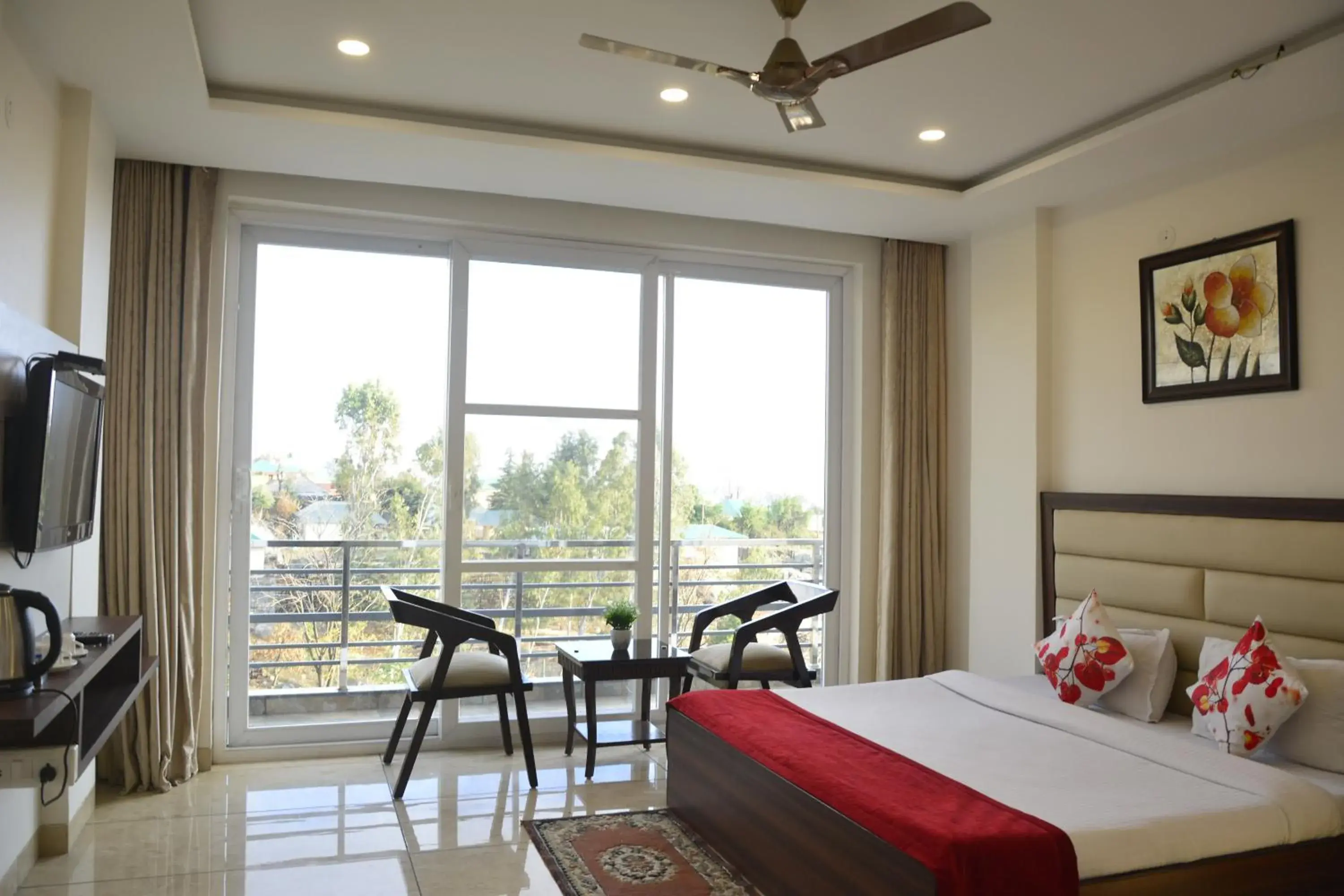 View (from property/room), Bed in SERENE SUITES View (from property/room), Bed in SERENE SUITES