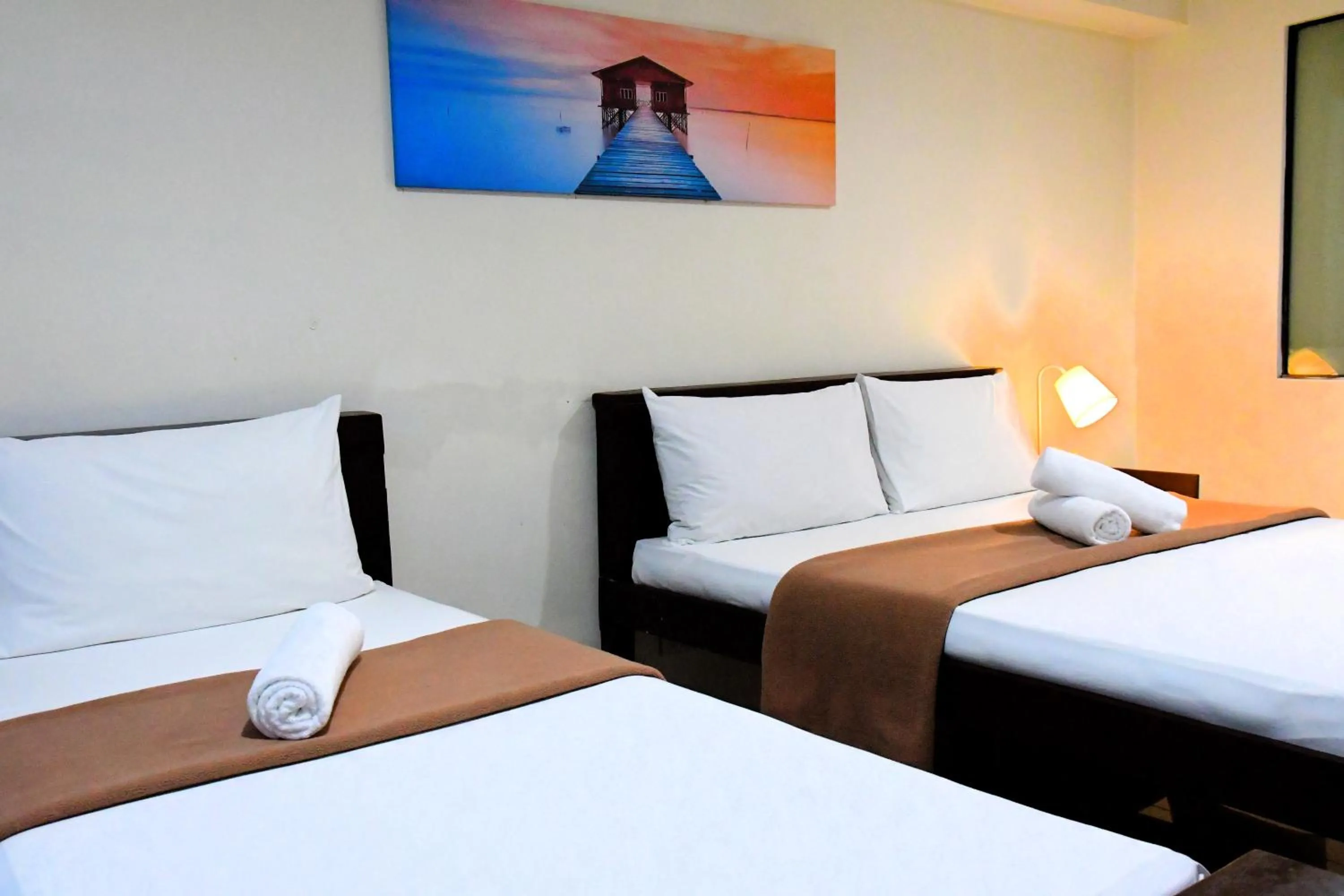 Bed in Arzo Hotel Makati